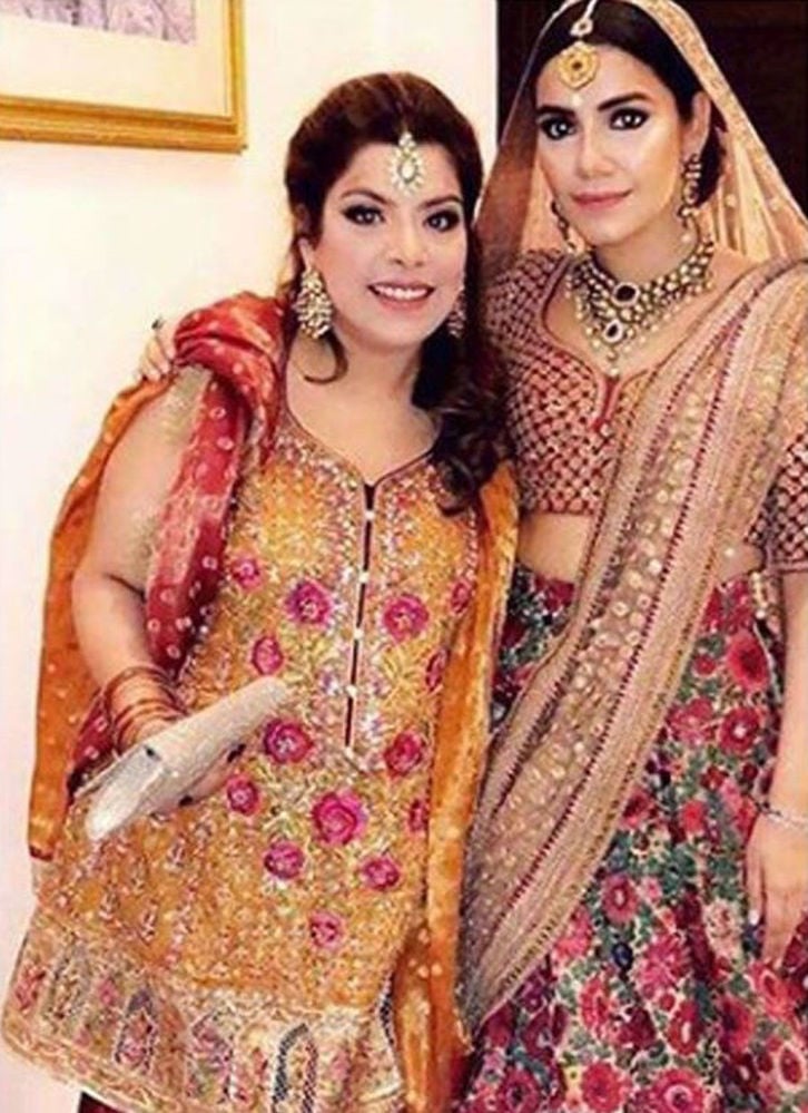 Eesha Hussain In A Burnt Orange And Scarlet Red Ensemble