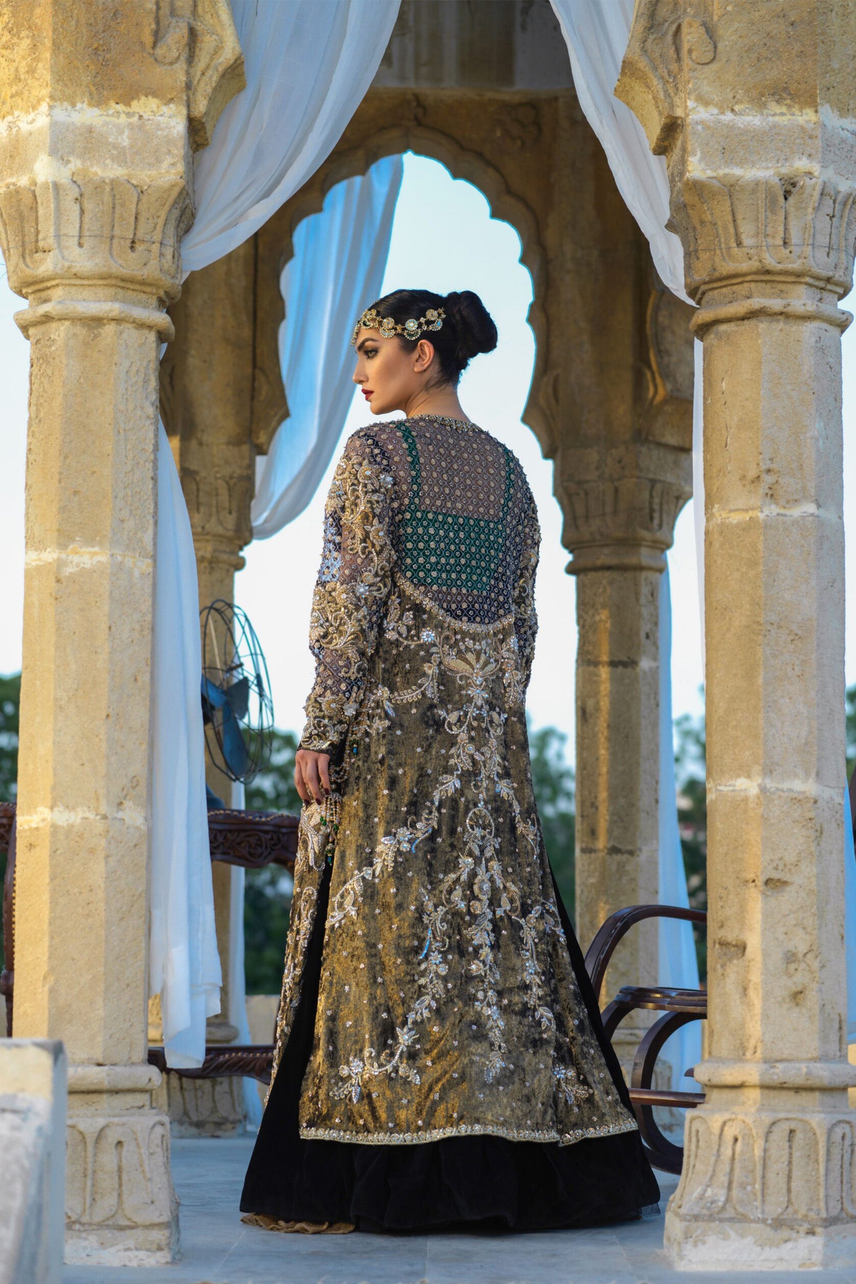 Gold Velvet Coat with Emerald Bustier & Black Velvet Cowl Lehenga