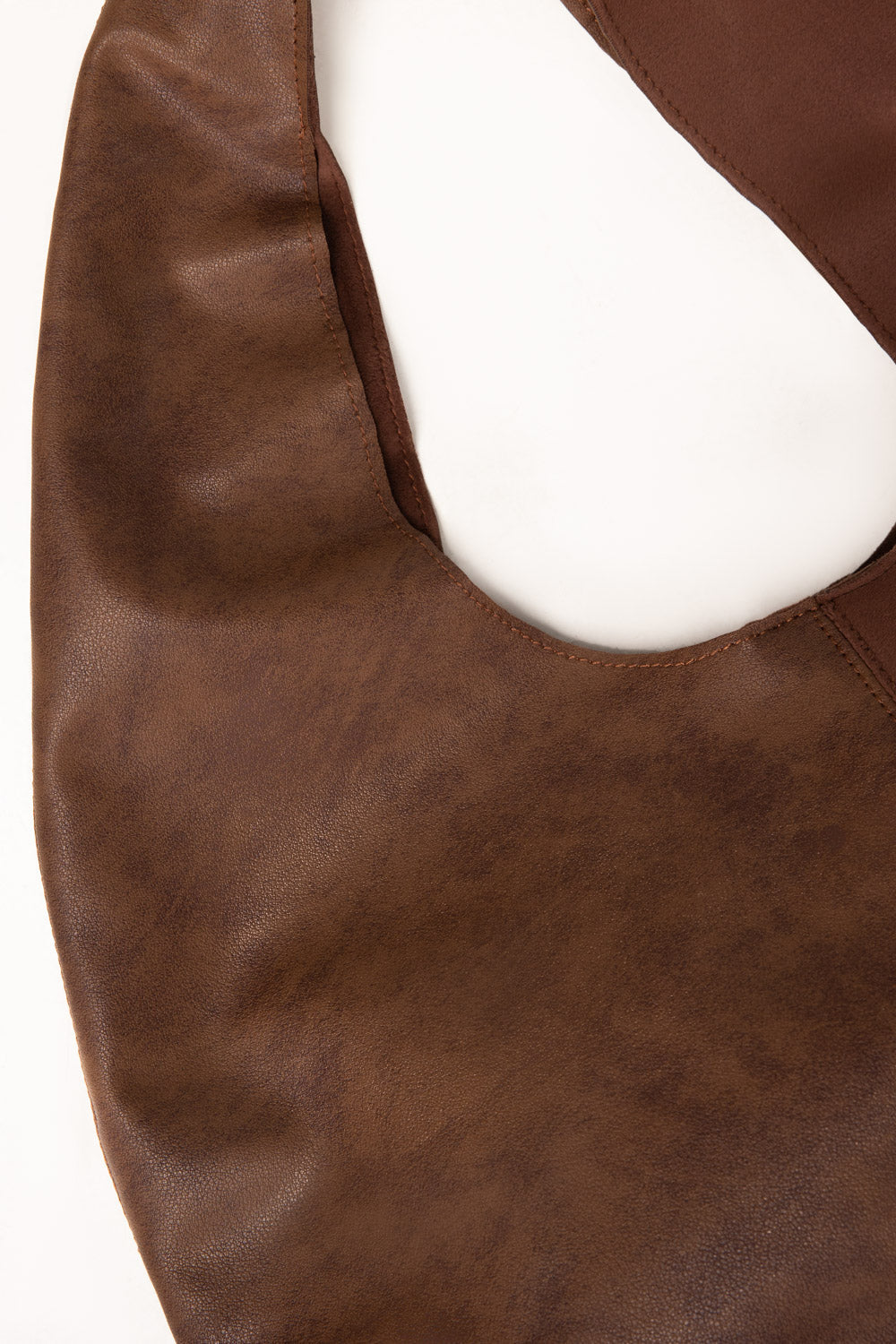 https://cdn.shopify.com/s/files/1/0706/3253/8159/files/458291-tan-shoulderbag-closeup-ideas.jpg?v=1770807380