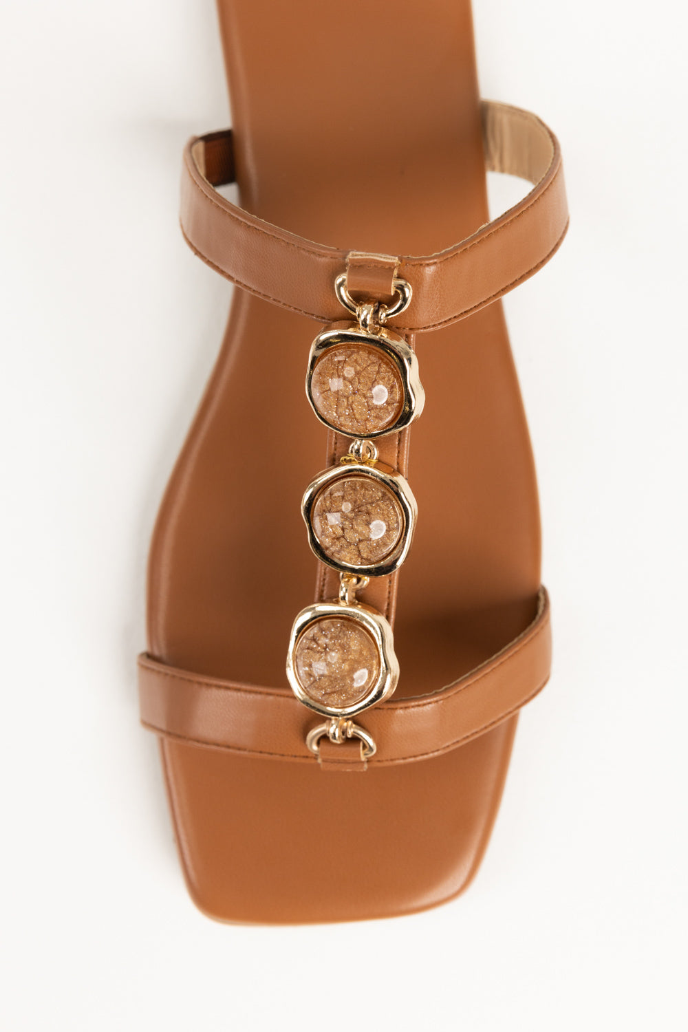 https://cdn.shopify.com/s/files/1/0706/3253/8159/files/467841-tan-slipper-closeup1-ideas.jpg?v=1779690514