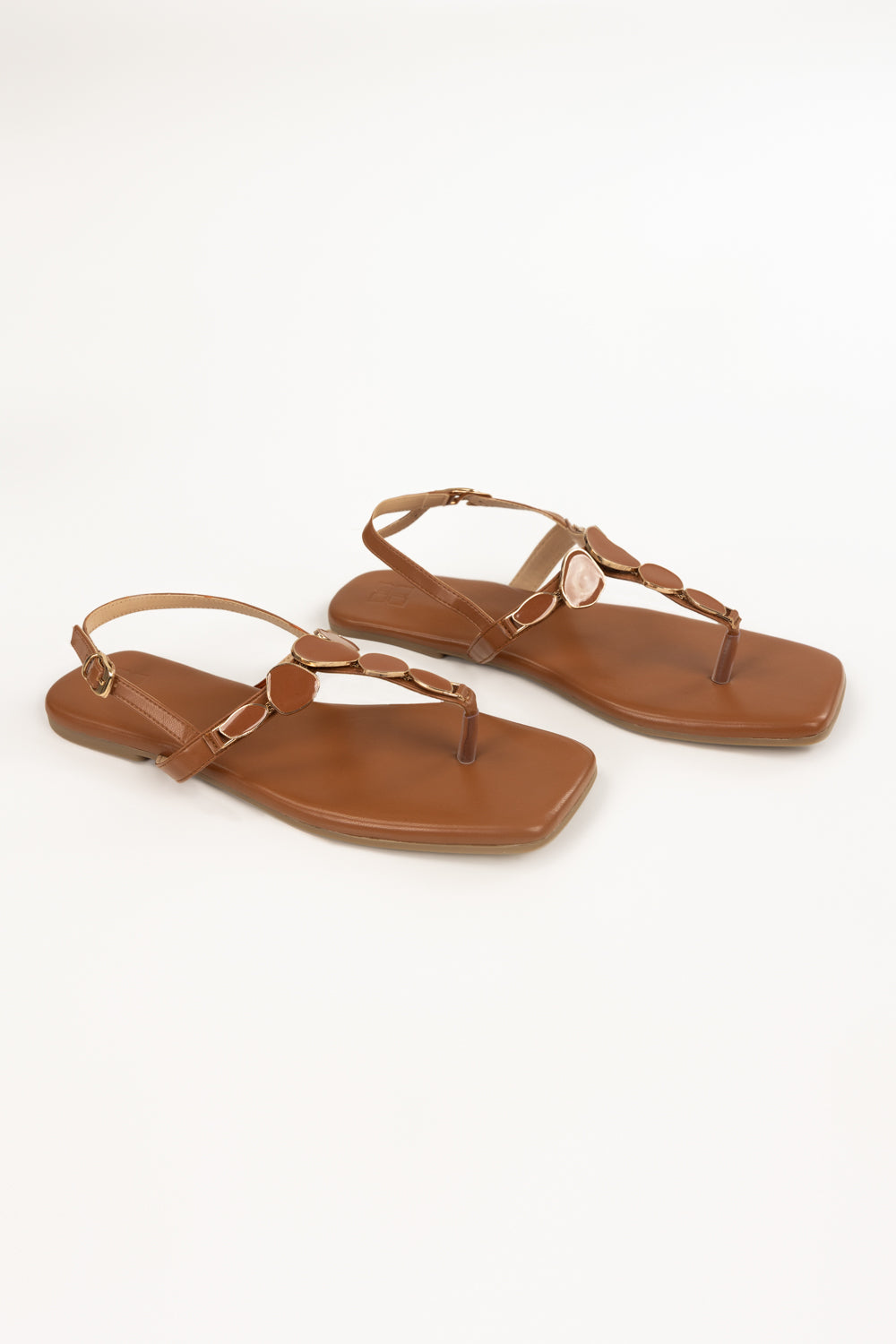 https://cdn.shopify.com/s/files/1/0706/3253/8159/files/467868-tan-sandal-side1-ideas.jpg?v=1779690609