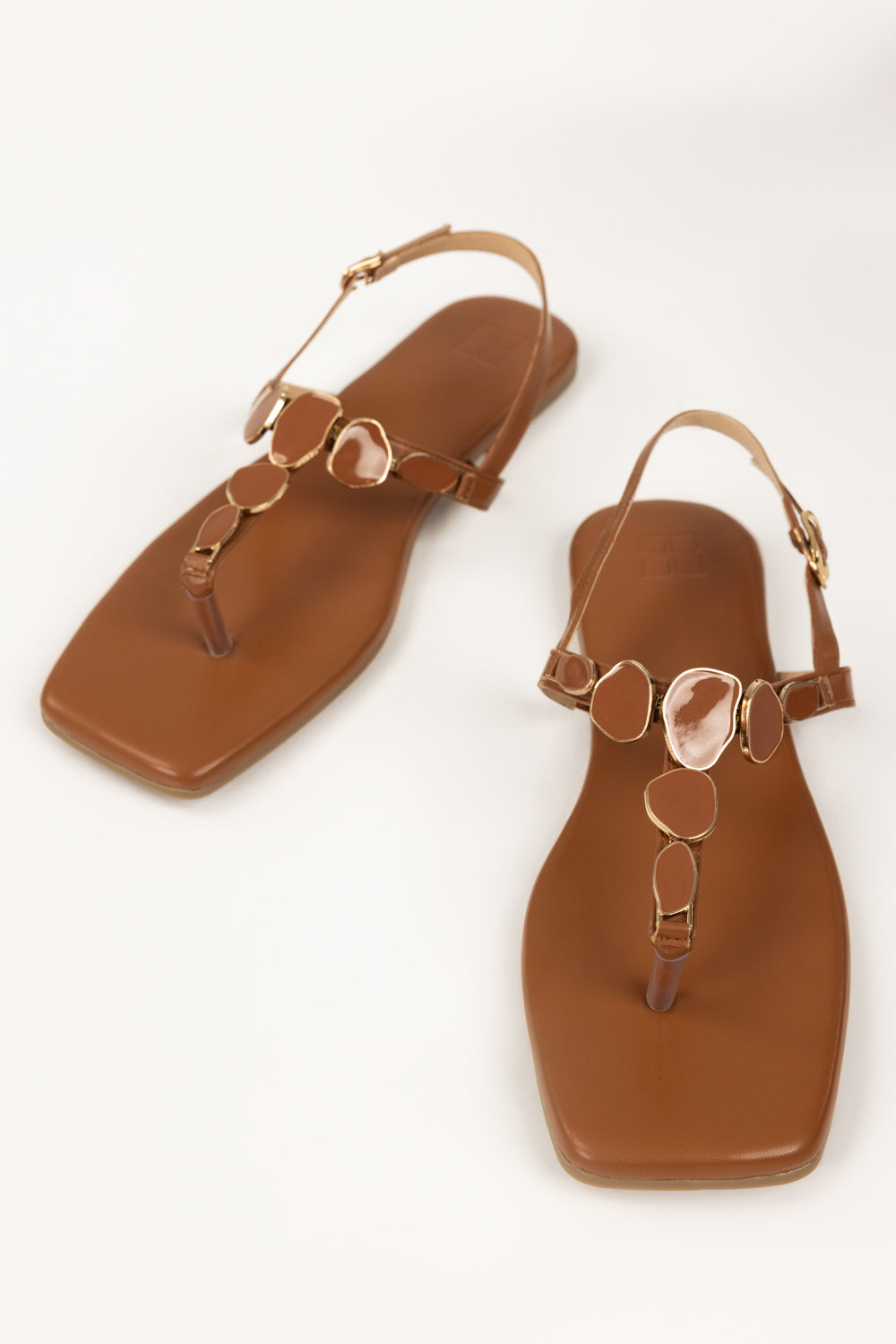 https://cdn.shopify.com/s/files/1/0706/3253/8159/files/467868-tan-sandal-top1-ideas.jpg?v=1779690609