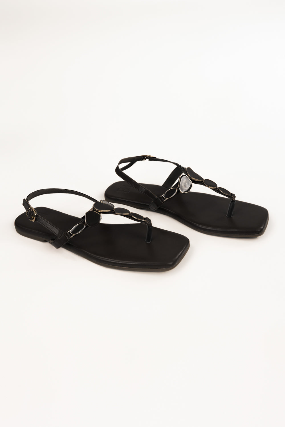 https://cdn.shopify.com/s/files/1/0706/3253/8159/files/467874-black-sandal-side1-ideas.jpg?v=1779690658
