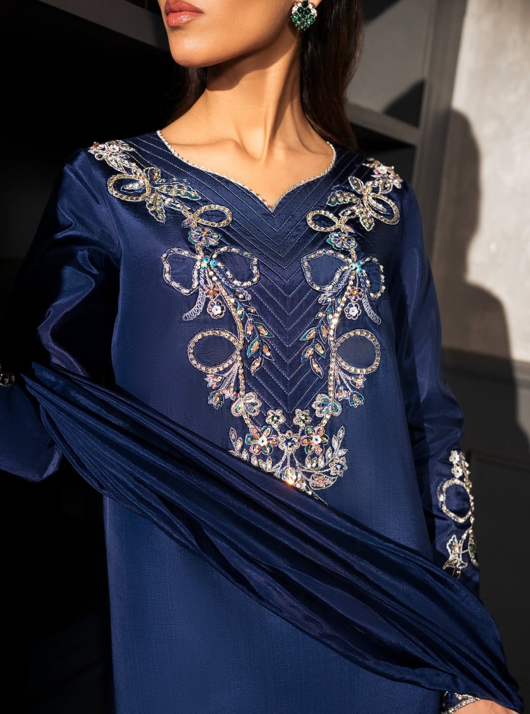 https://cdn.shopify.com/s/files/1/0923/1931/8403/files/Enveloped_in_midnight_blue_this_elongated_tailored_silhouette_feat_3.jpg?v=1773745513