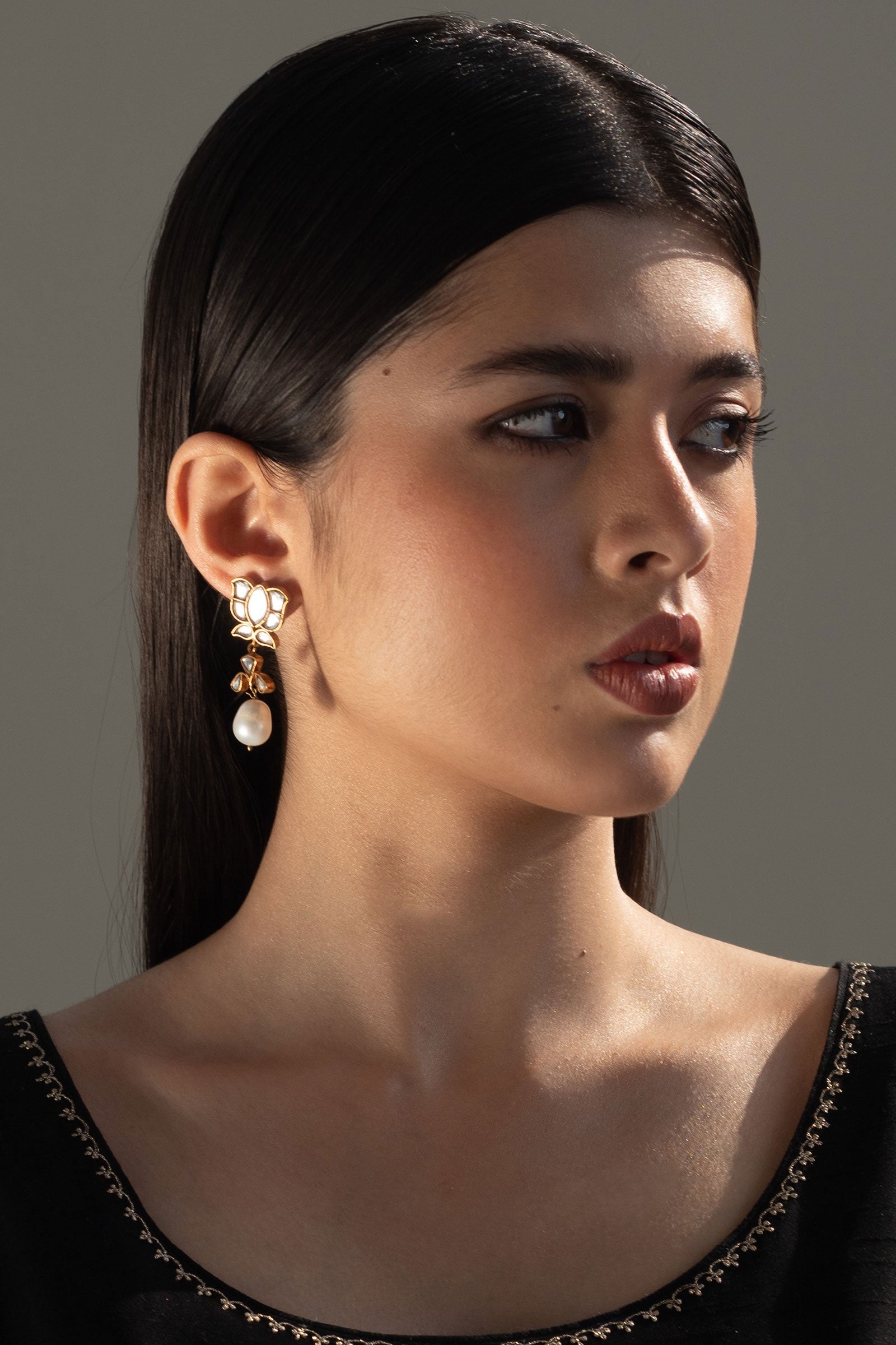 https://cdn.shopify.com/s/files/1/0340/8376/6405/files/GoldplatedLotusEarrings1.jpg?v=1702381939