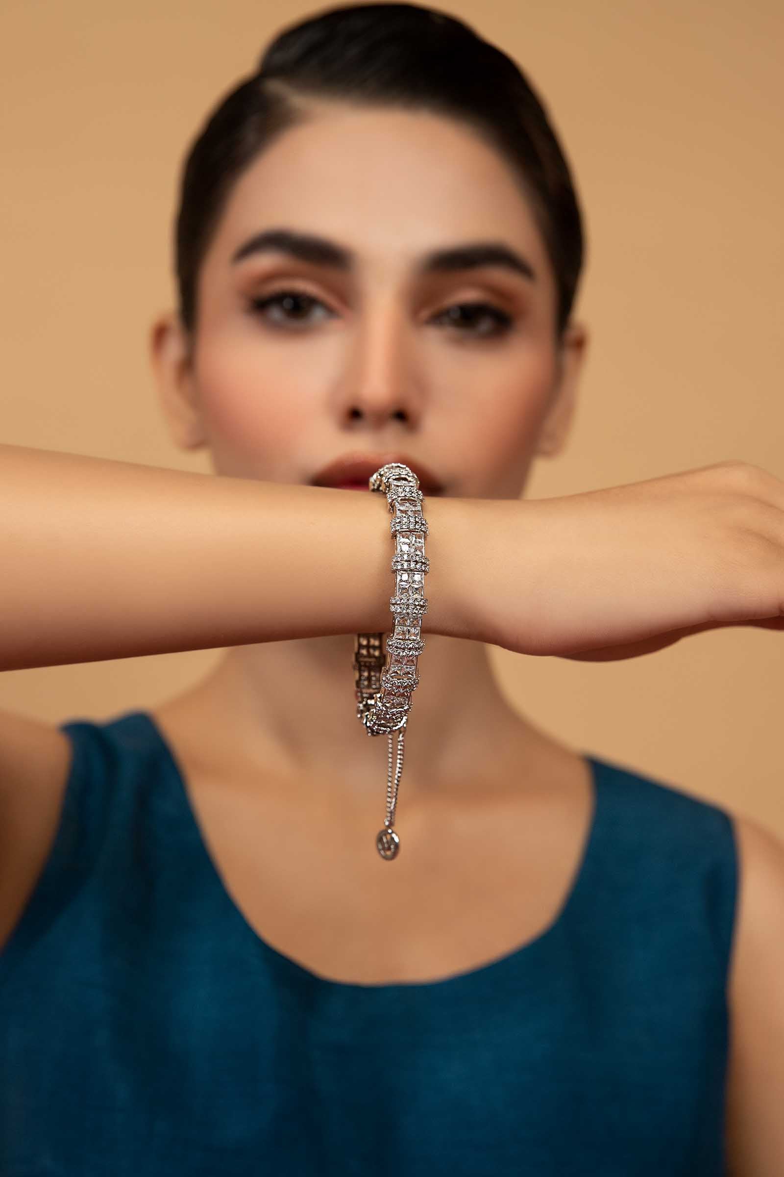 https://cdn.shopify.com/s/files/1/0620/8788/9062/files/JCH-W23-03-WhiteZircon.jpg?v=1696939290