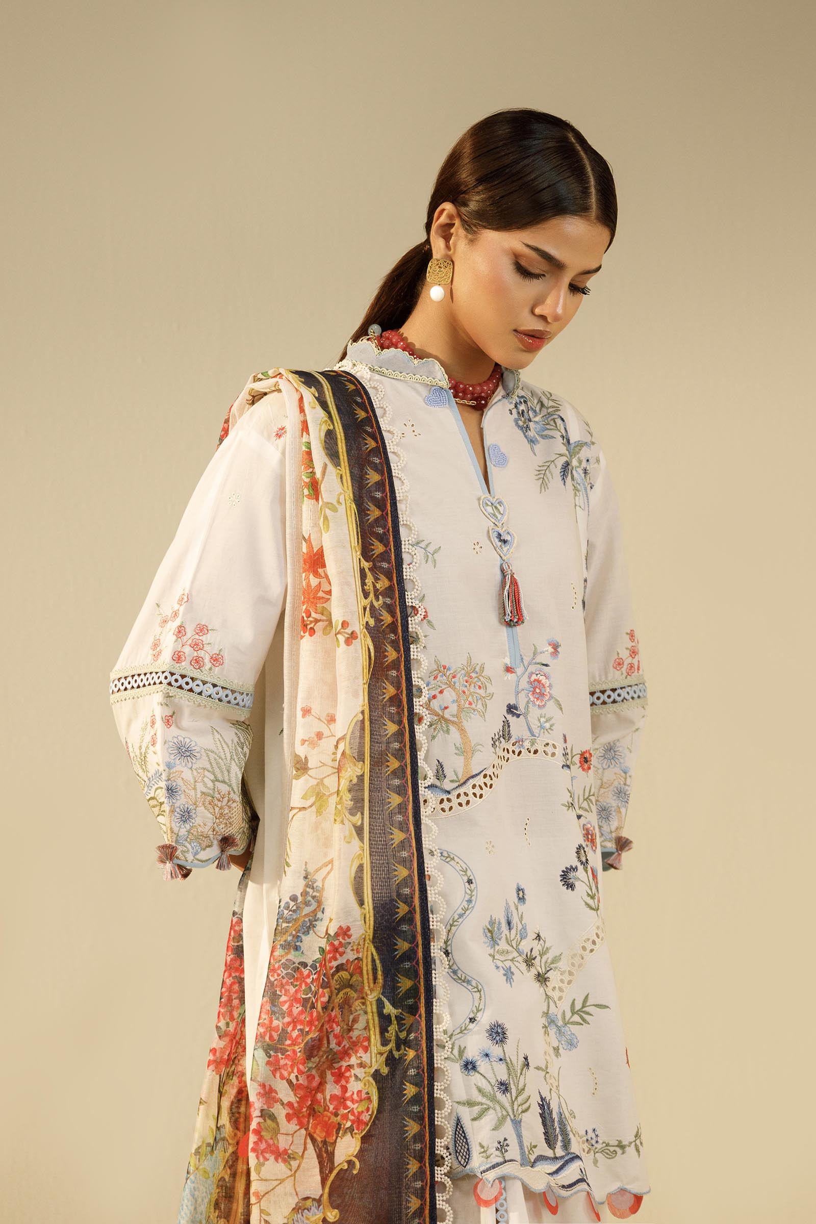 Unstitched Embroidered 3 Piece Muzlin Suit