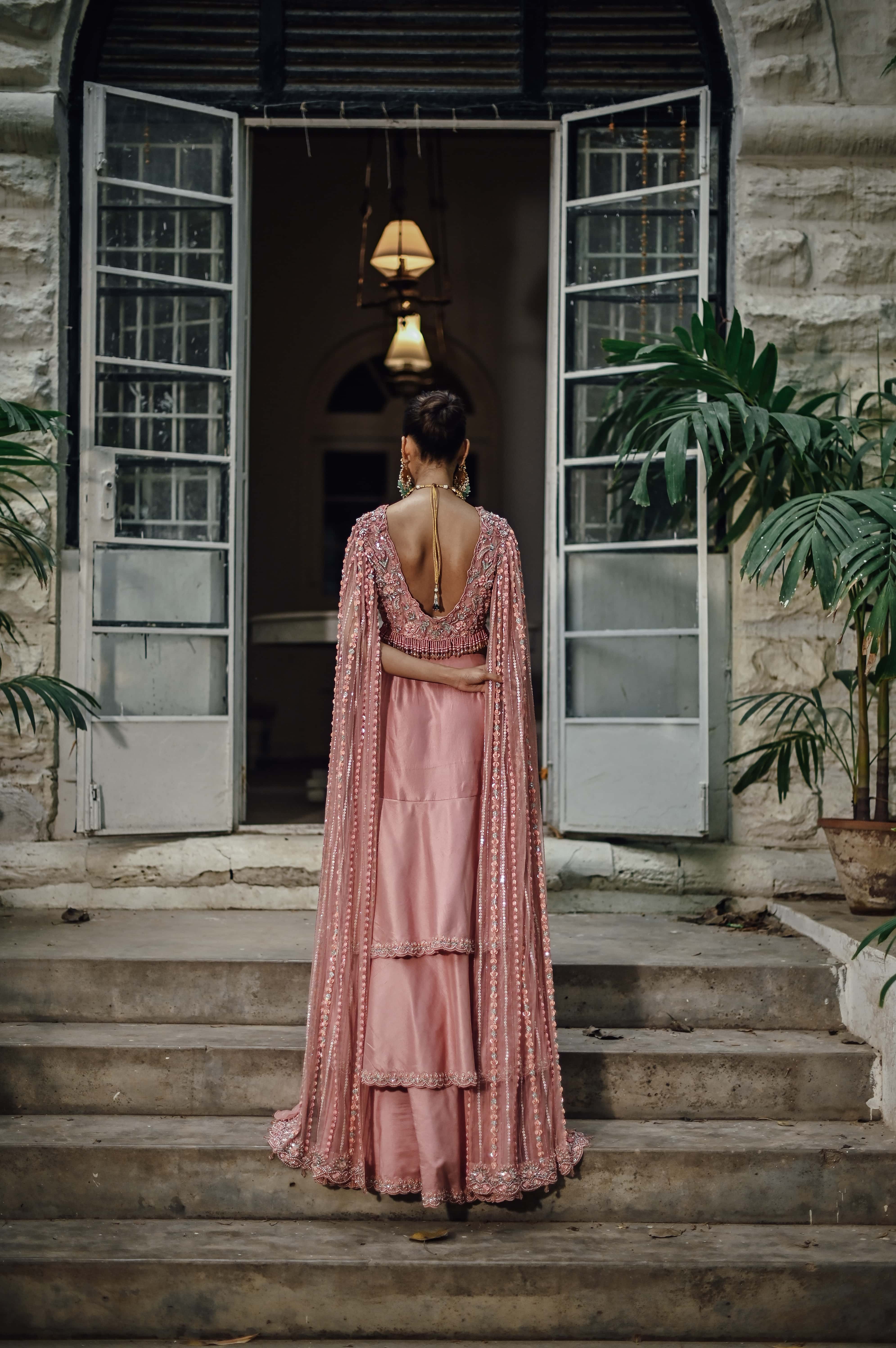 Pink Embellished Choli with Ruffled Skirt and Net Dupatta