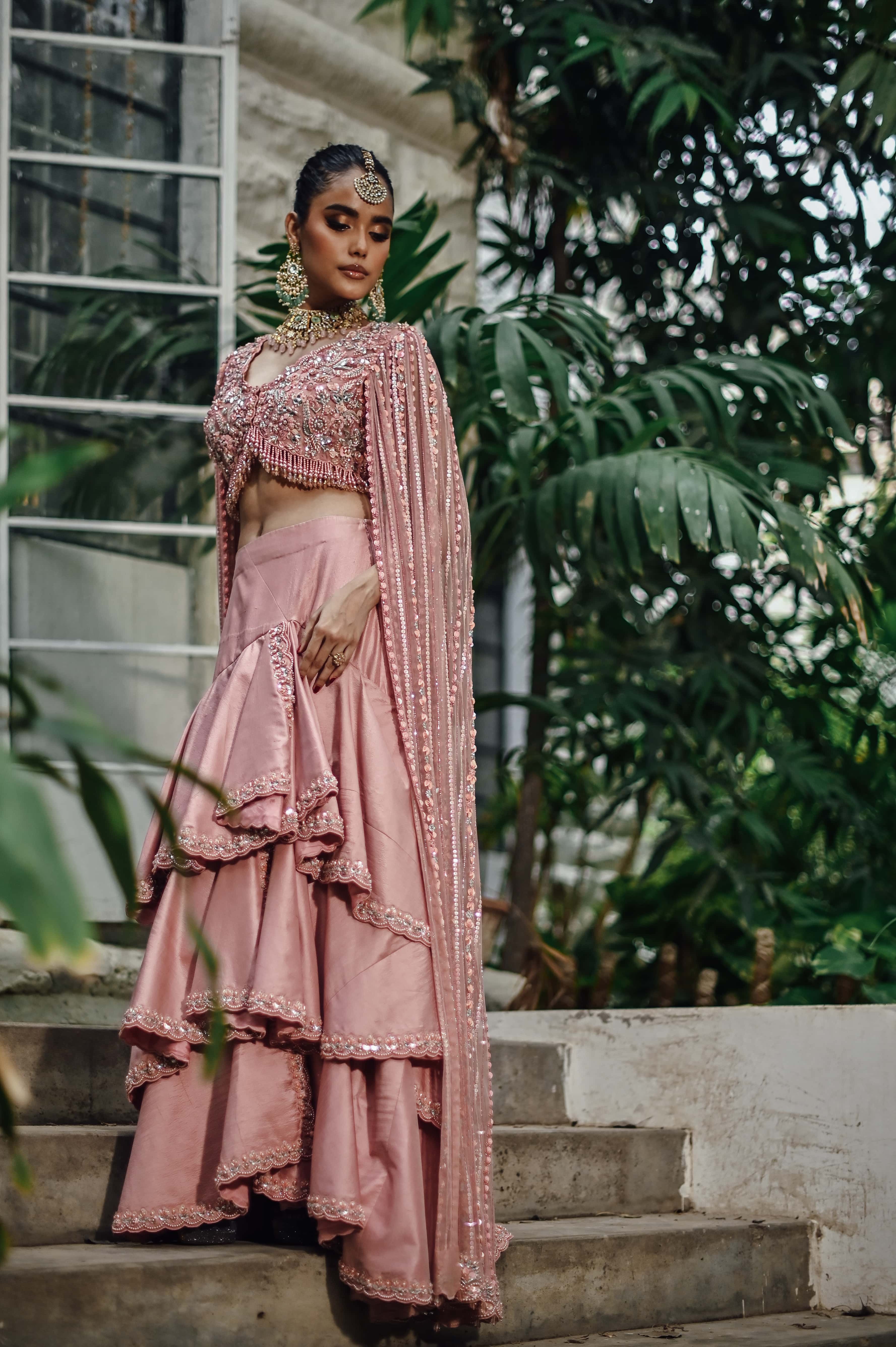 Pink Embellished Choli with Ruffled Skirt and Net Dupatta