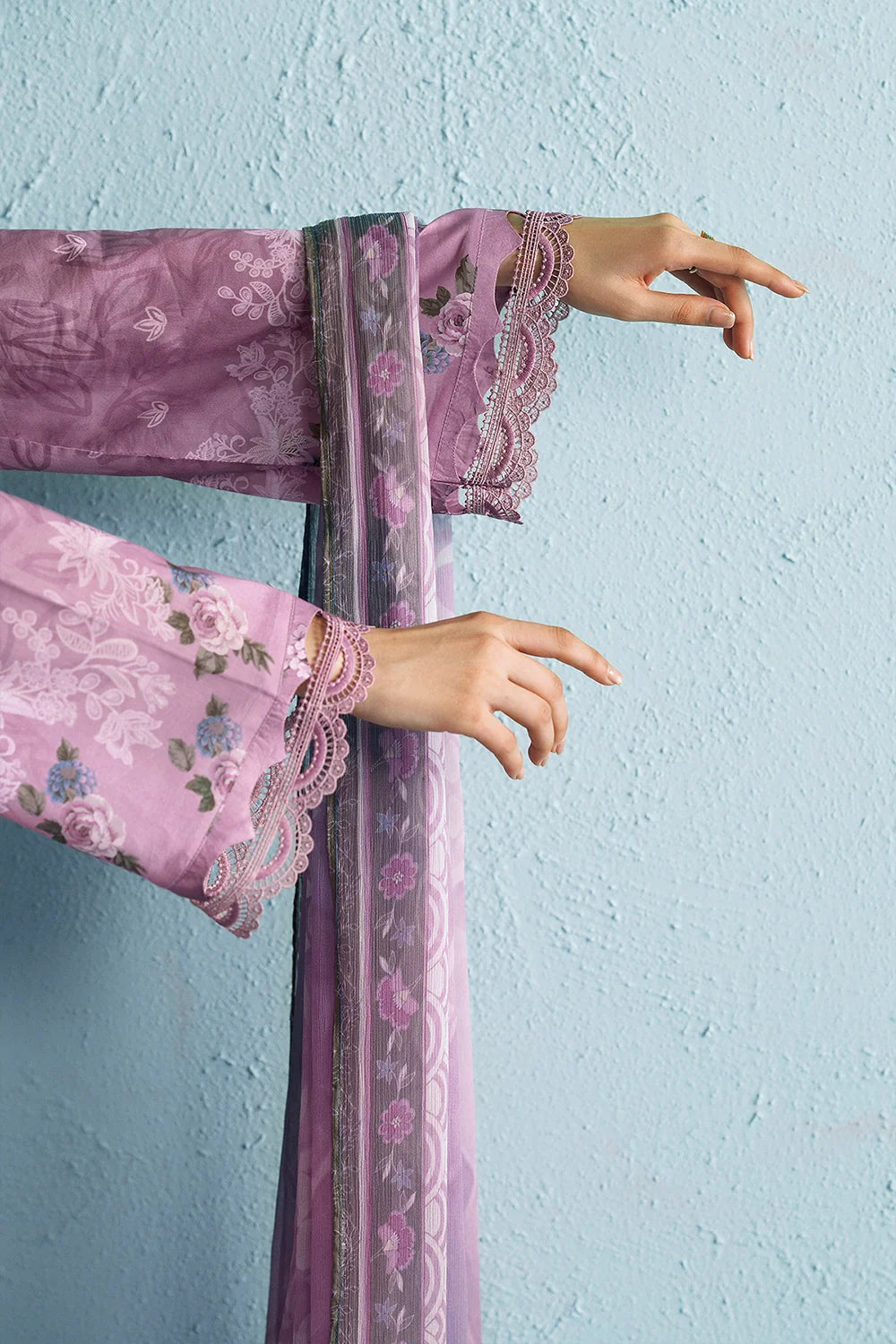 https://cdn.shopify.com/s/files/1/0019/7217/4947/files/PinkLawnShirtwithChiffonDupattaandCottonTrouser-SummerySky-Vol1-30.webp?v=1781347231
