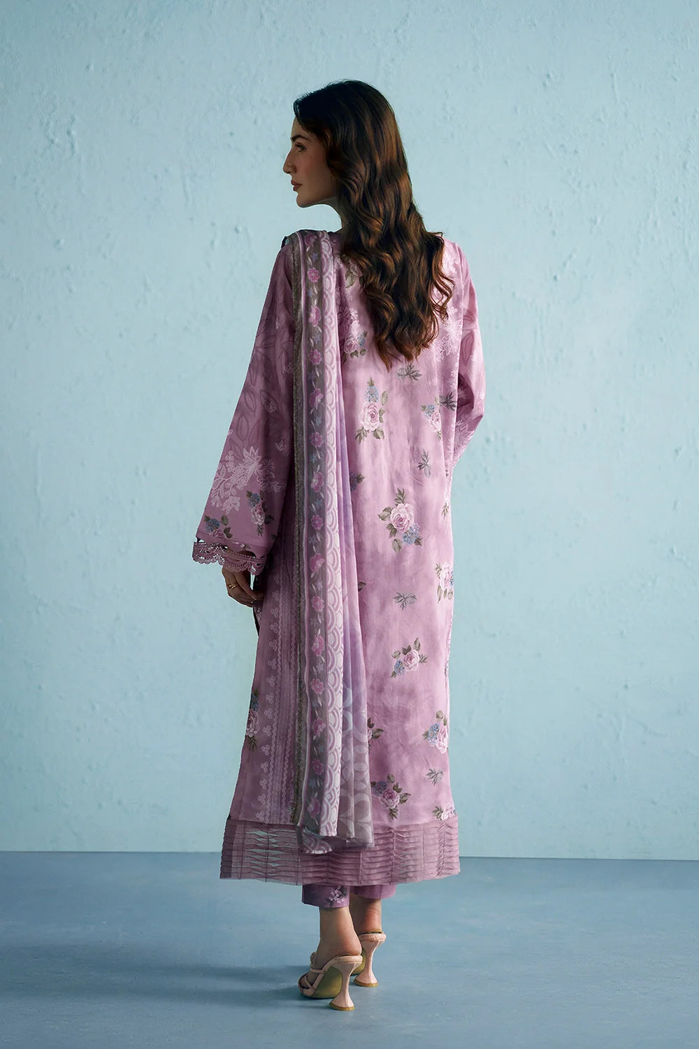 https://cdn.shopify.com/s/files/1/0019/7217/4947/files/PinkLawnShirtwithChiffonDupattaandCottonTrouser-SummerySky-Vol1-31.webp?v=1781347230