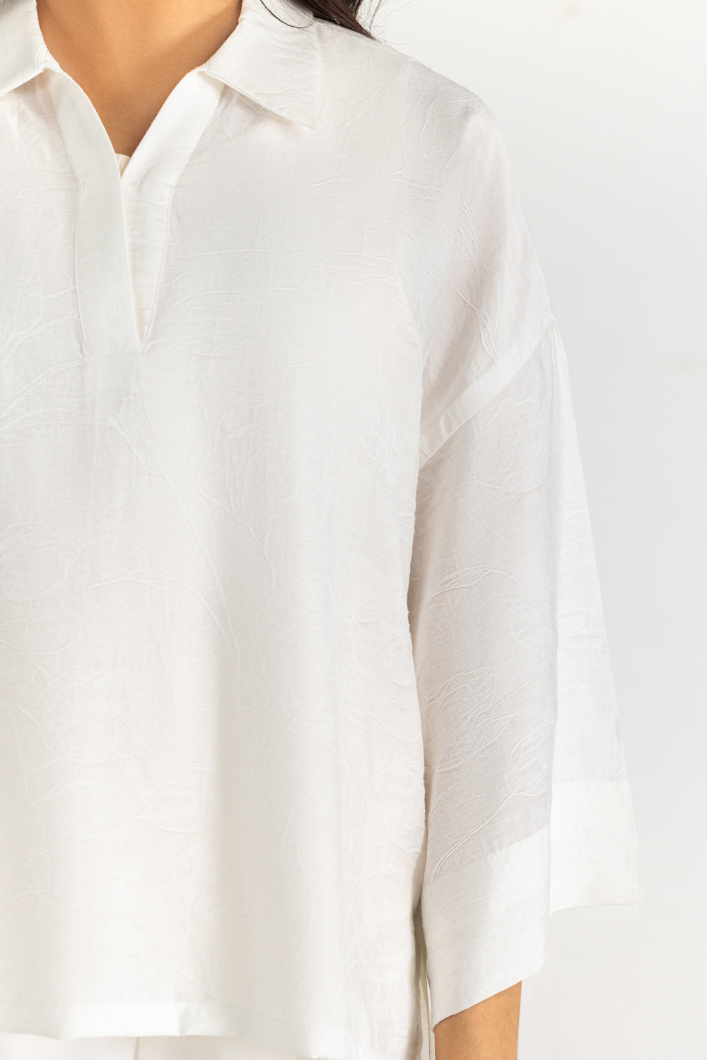 https://cdn.shopify.com/s/files/1/0706/3253/8159/files/Salt-Women-Blouse-Color-White-67_-Viscose-20_-Linen-Regular-Fit-WM-BLS-SS26-RA13-Cuff.jpg?v=1775198688