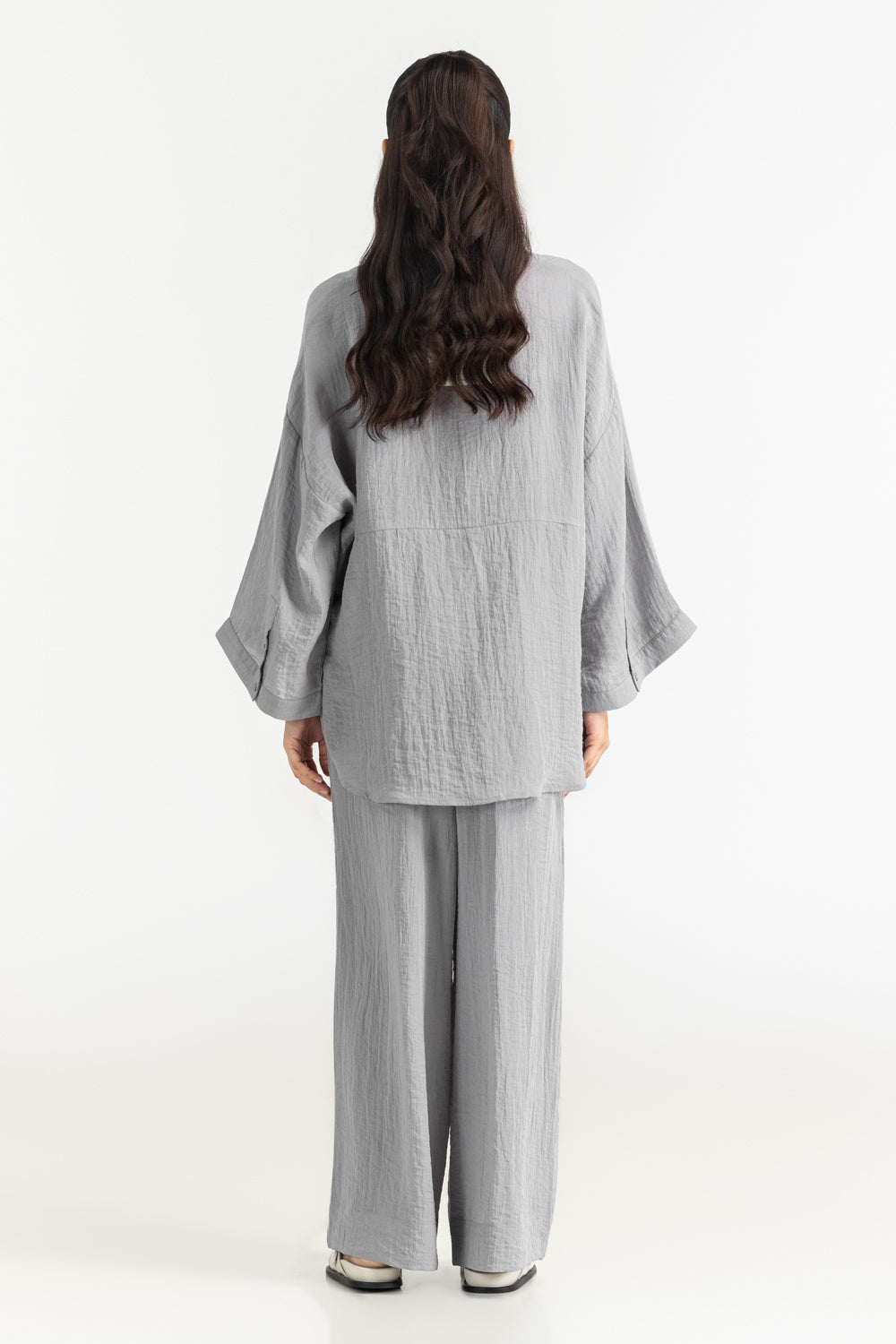 https://cdn.shopify.com/s/files/1/0706/3253/8159/files/Salt-Women-Trousers-Color-Grey-74_-Rayon-26_-Nylon-Regular-Fit-WM-COD-SS26-RA21B-Back.jpg?v=1775198821