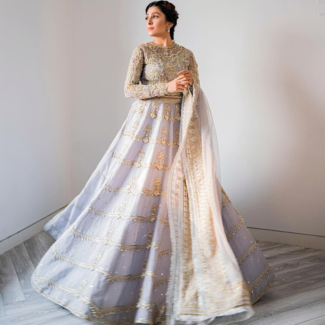 https://cdn.shopify.com/s/files/1/0523/4327/5696/files/elai-ice-blue-bridal-lehnga-mysie-5.jpg?v=1757926267