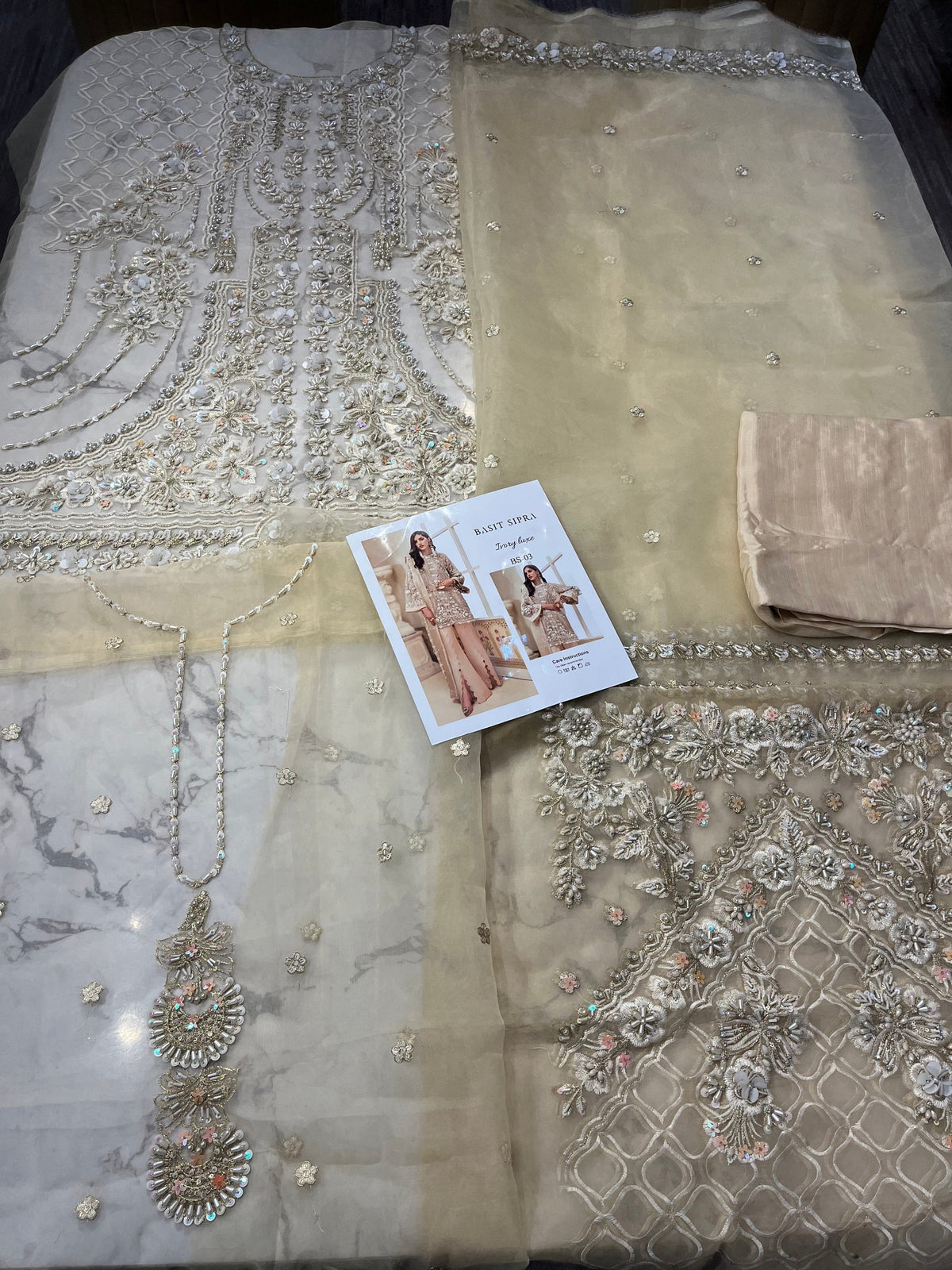 Baasit Sipra – Ivory Luxe Style