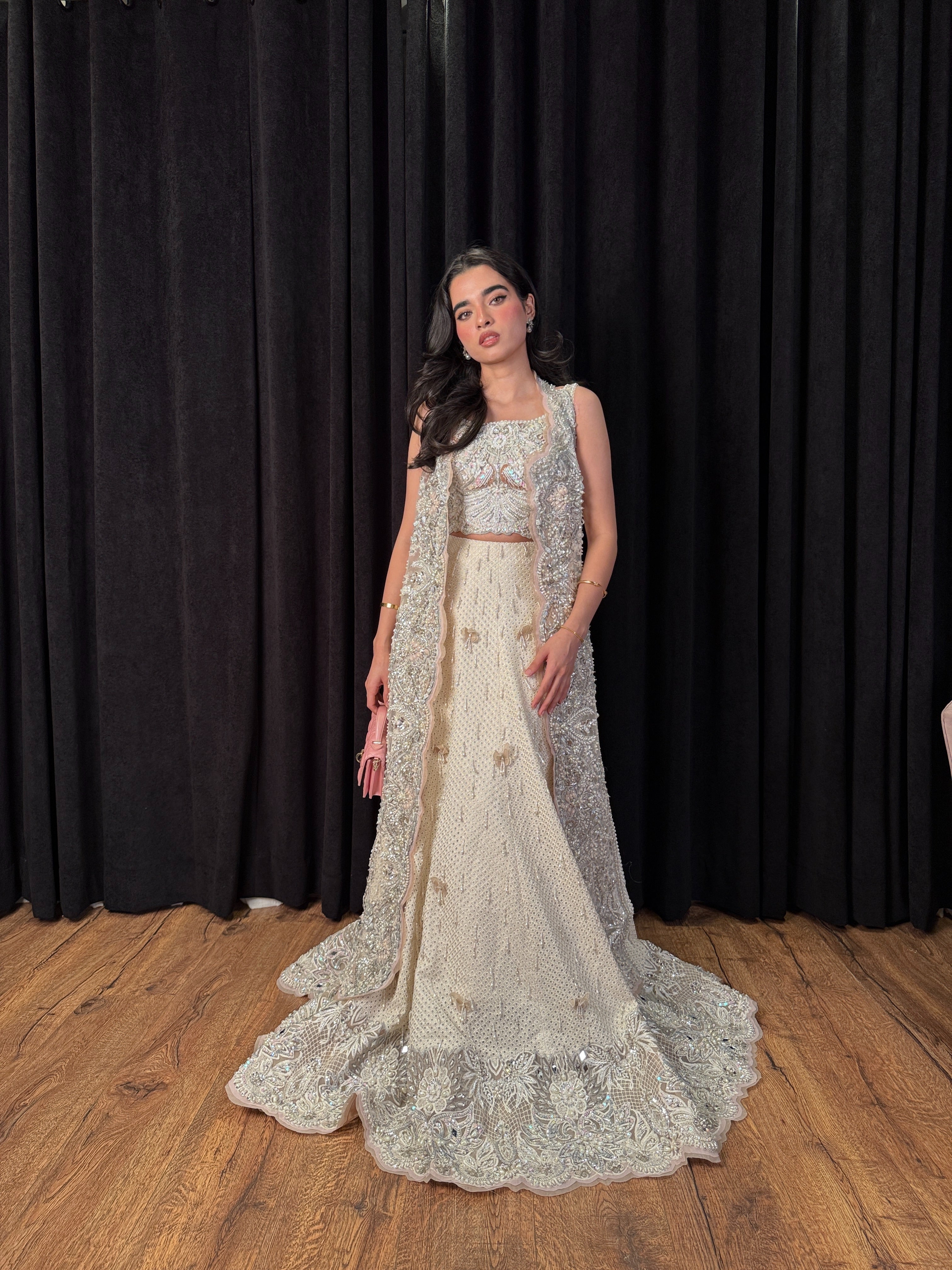 Designer ivory lehenga choli with embellished long jacket – Minsa outfit by Mysie by Tahira, Pakistani wedding and occasion wear.