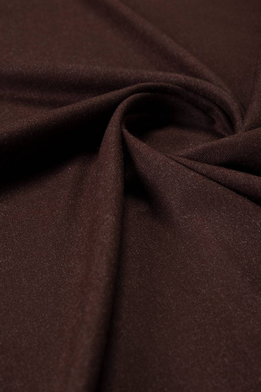 https://cdn.shopify.com/s/files/1/0706/3253/8159/files/opus_wonderer_unstitched_fabric_blended_with_gift_box-chocolate_brown_3.jpg?v=1758383532