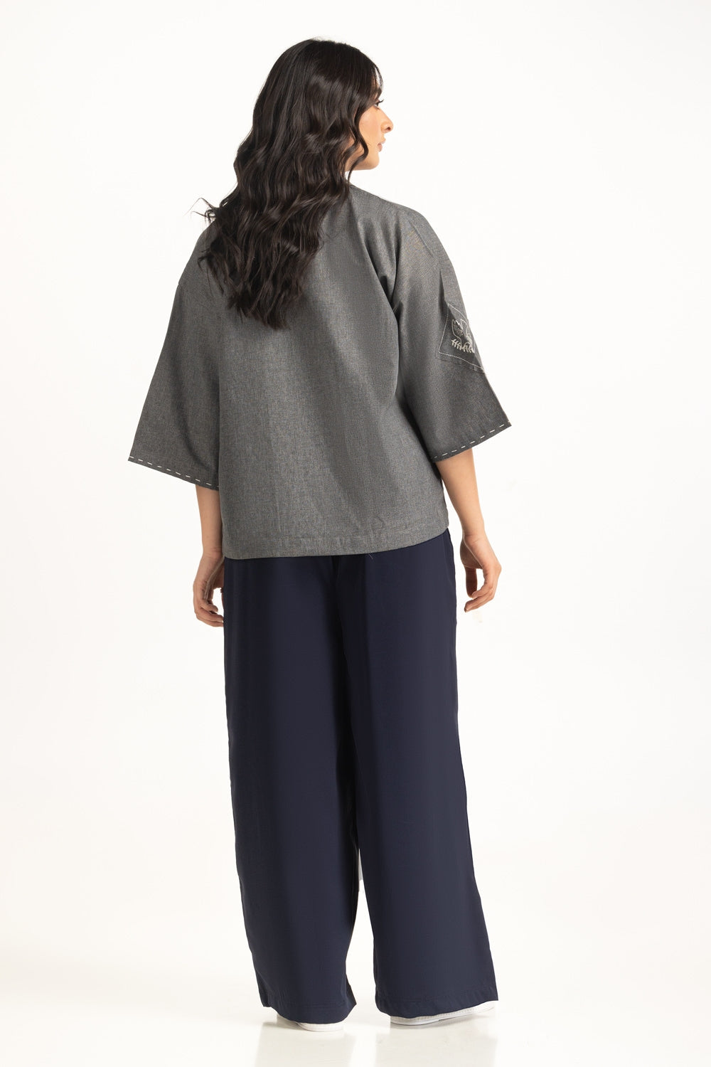 https://cdn.shopify.com/s/files/1/0706/3253/8159/files/women-casual-shirts-color-grey-blended-regular-fit-wm-cs-ss25-408-back.jpg?v=1758455969
