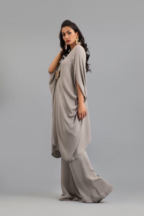 Draped Top with Crystal Flower Brooch and Flared Pants