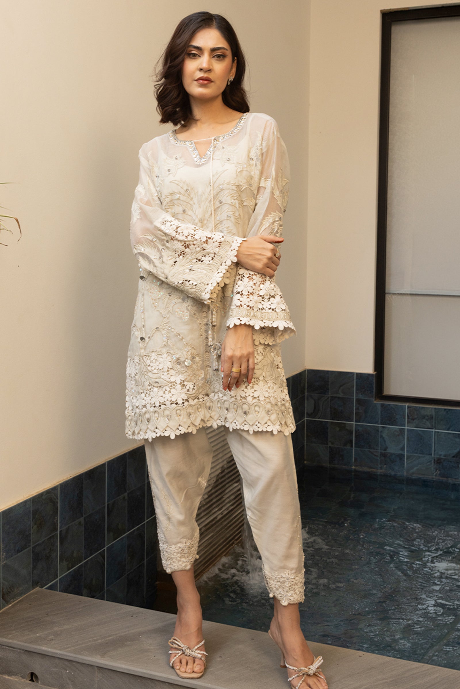 https://cdn.shopify.com/s/files/1/0790/0672/8441/files/13---OFFWHITE-INAARA-_1.jpg?v=1772760776
