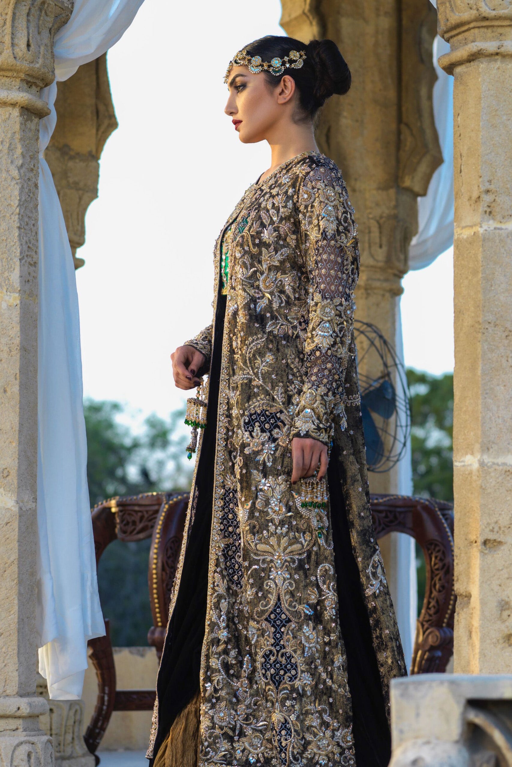 Gold Velvet Coat with Emerald Bustier & Black Velvet Cowl Lehenga