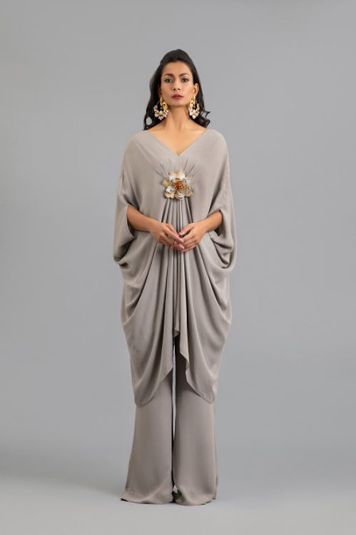 Draped Top with Crystal Flower Brooch and Flared Pants
