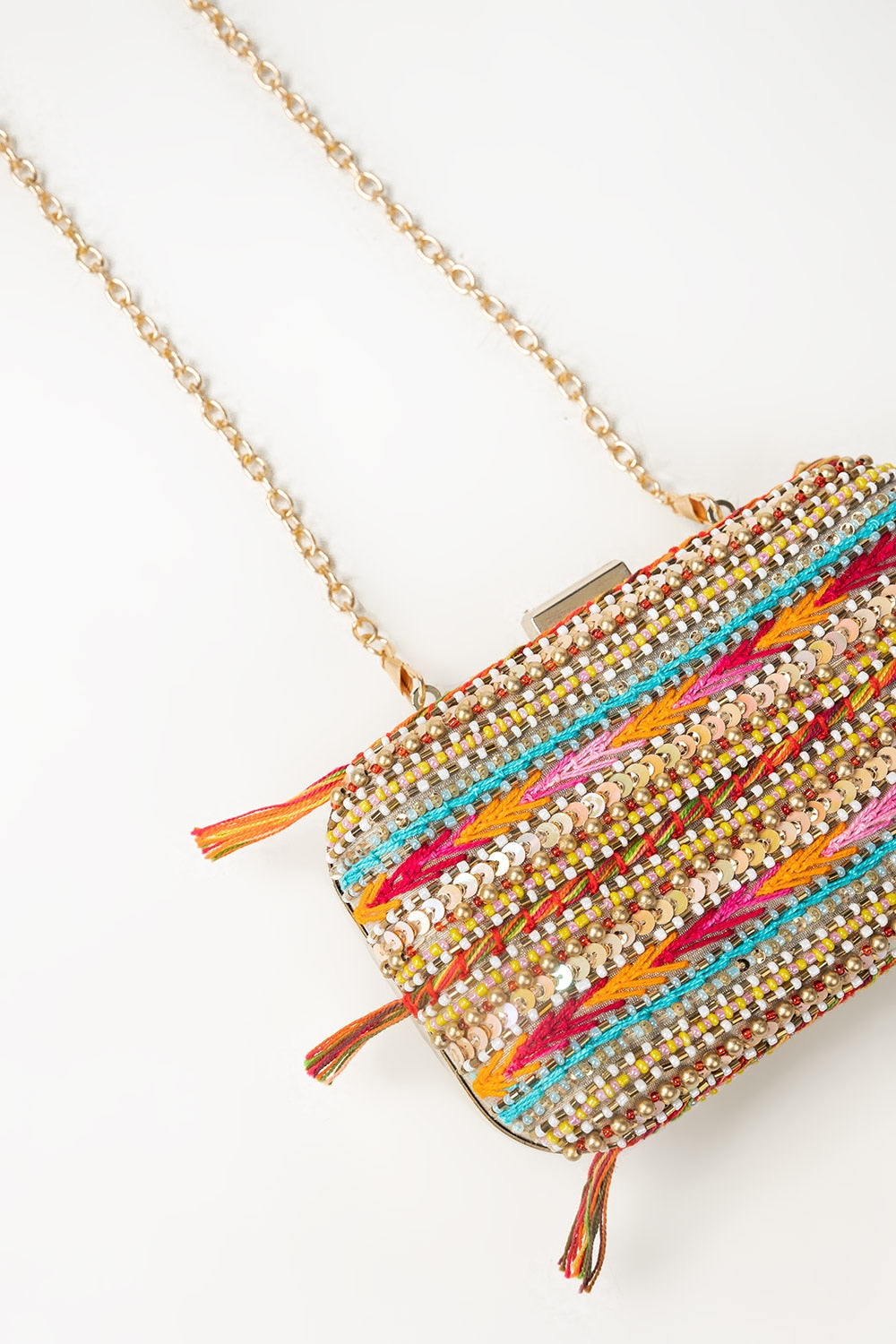 https://cdn.shopify.com/s/files/1/0706/3253/8159/files/427786-multi-clutch-bag-closeup-gulahmed.jpg?v=1758371197