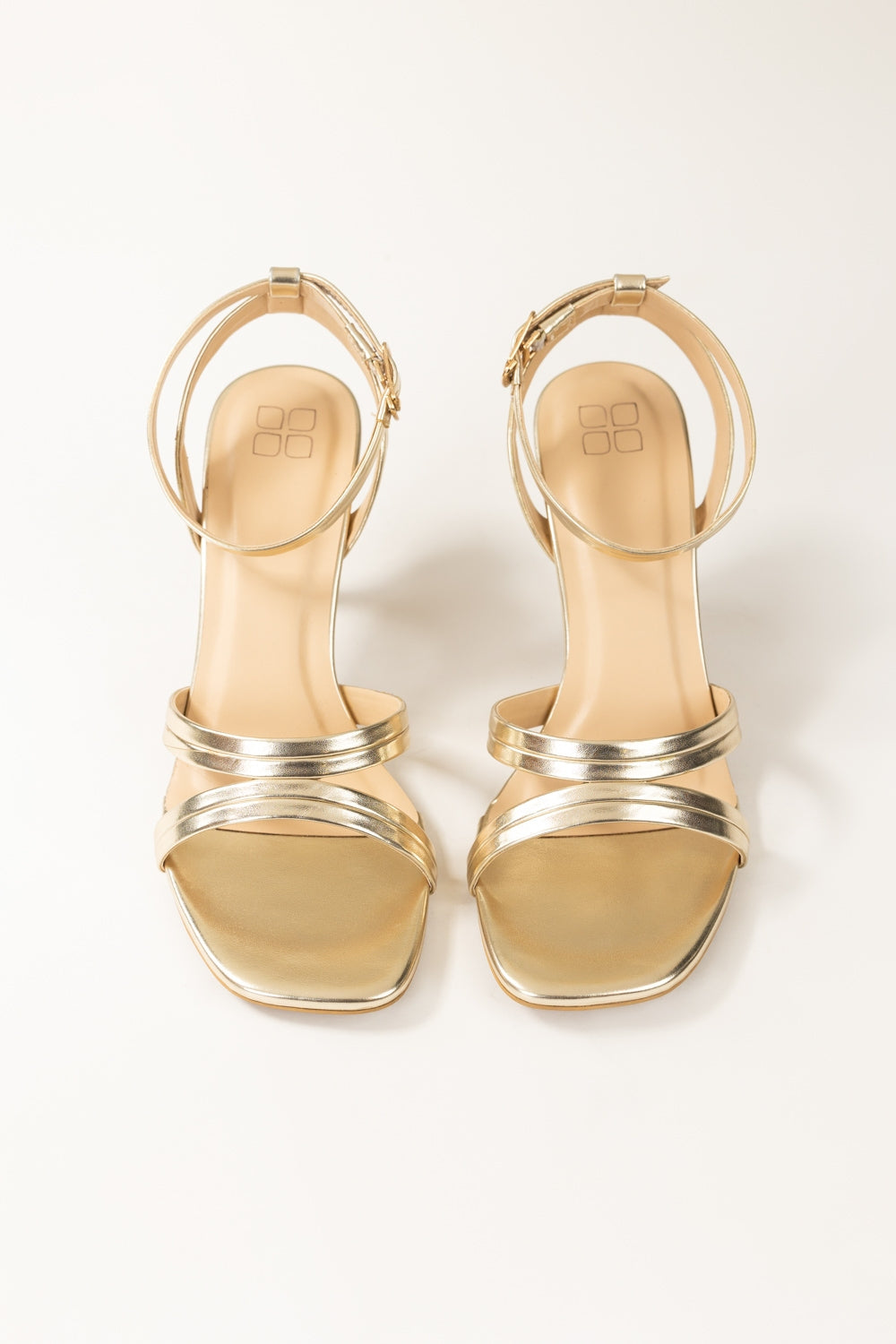 https://cdn.shopify.com/s/files/1/0706/3253/8159/files/434819-golden-heels-frontview-ideas.jpg?v=1758370997