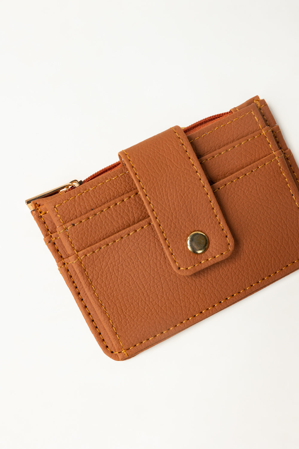 https://cdn.shopify.com/s/files/1/0706/3253/8159/files/444756-tan-cardholder-closeup-ideas.jpg?v=1759139119