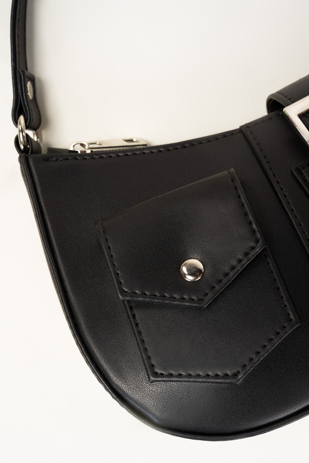 https://cdn.shopify.com/s/files/1/0706/3253/8159/files/446762-black-handbag-closeup2-ideas.jpg?v=1762942472