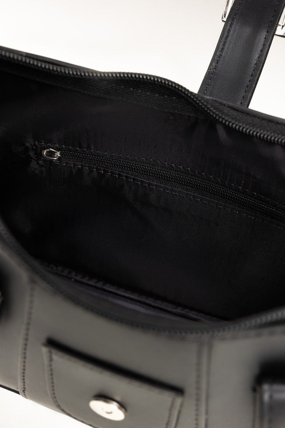 https://cdn.shopify.com/s/files/1/0706/3253/8159/files/446762-black-handbag-top2-ideas.jpg?v=1762942477
