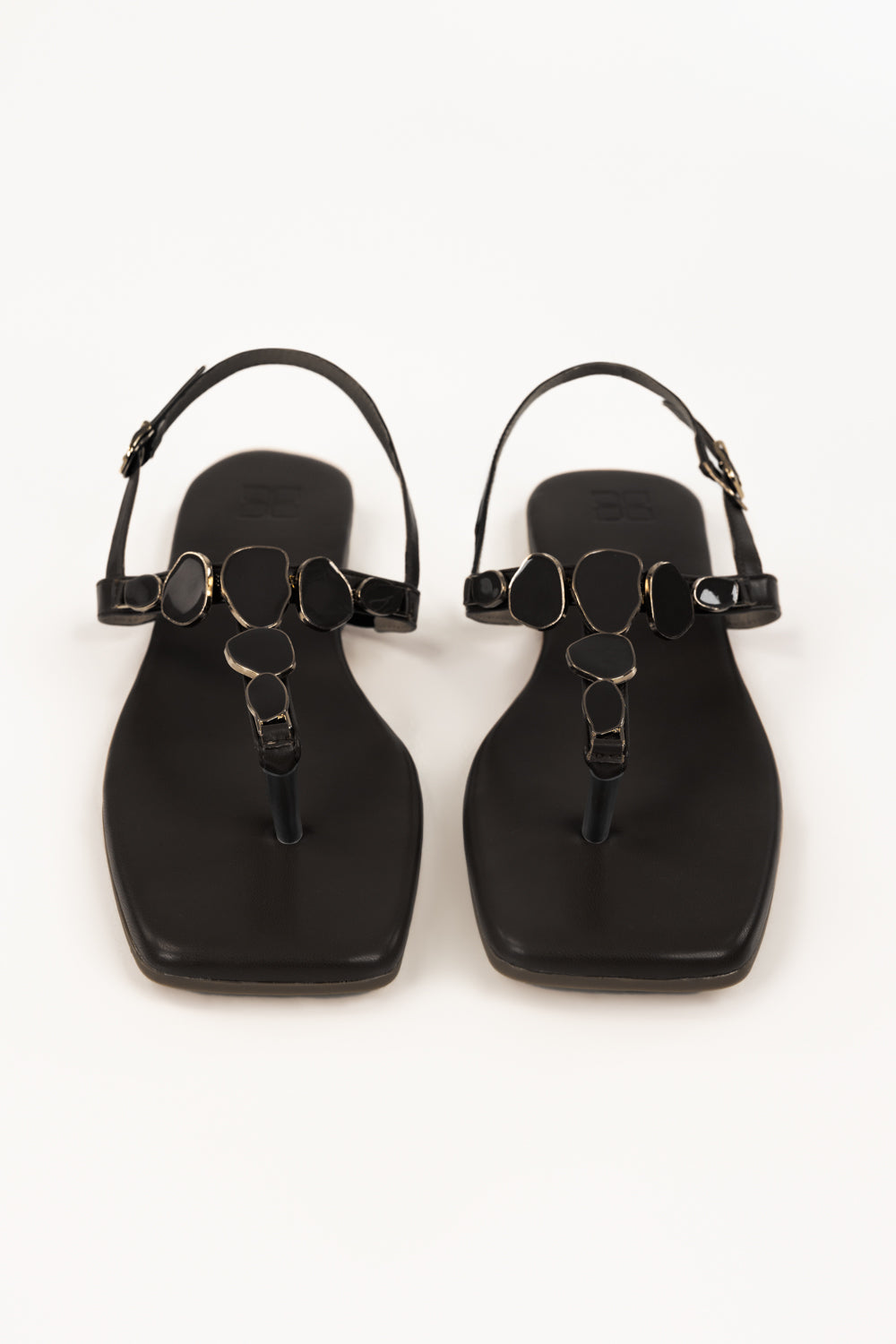 https://cdn.shopify.com/s/files/1/0706/3253/8159/files/467874-black-sandal-front-ideas.jpg?v=1779690658