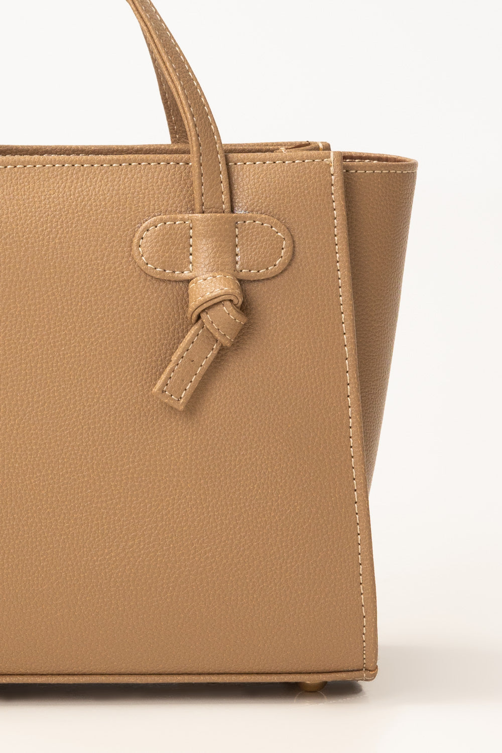 https://cdn.shopify.com/s/files/1/0706/3253/8159/files/471234-beige-minibag-closeup1-ideas.jpg?v=1778497001