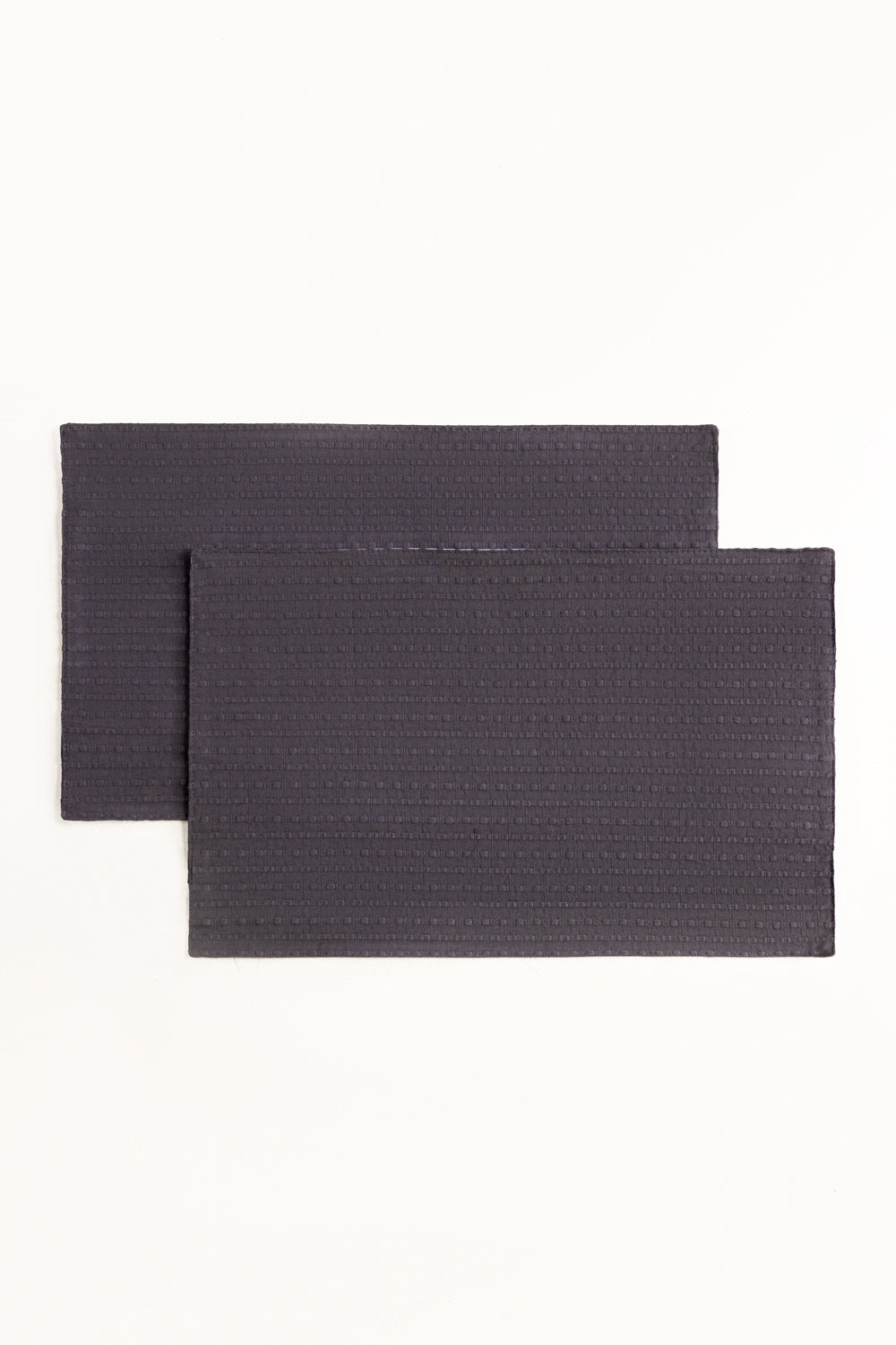 https://cdn.shopify.com/s/files/1/0706/3253/8159/files/CharcoalGreyDyedPlacemats_2.jpg?v=1771828358