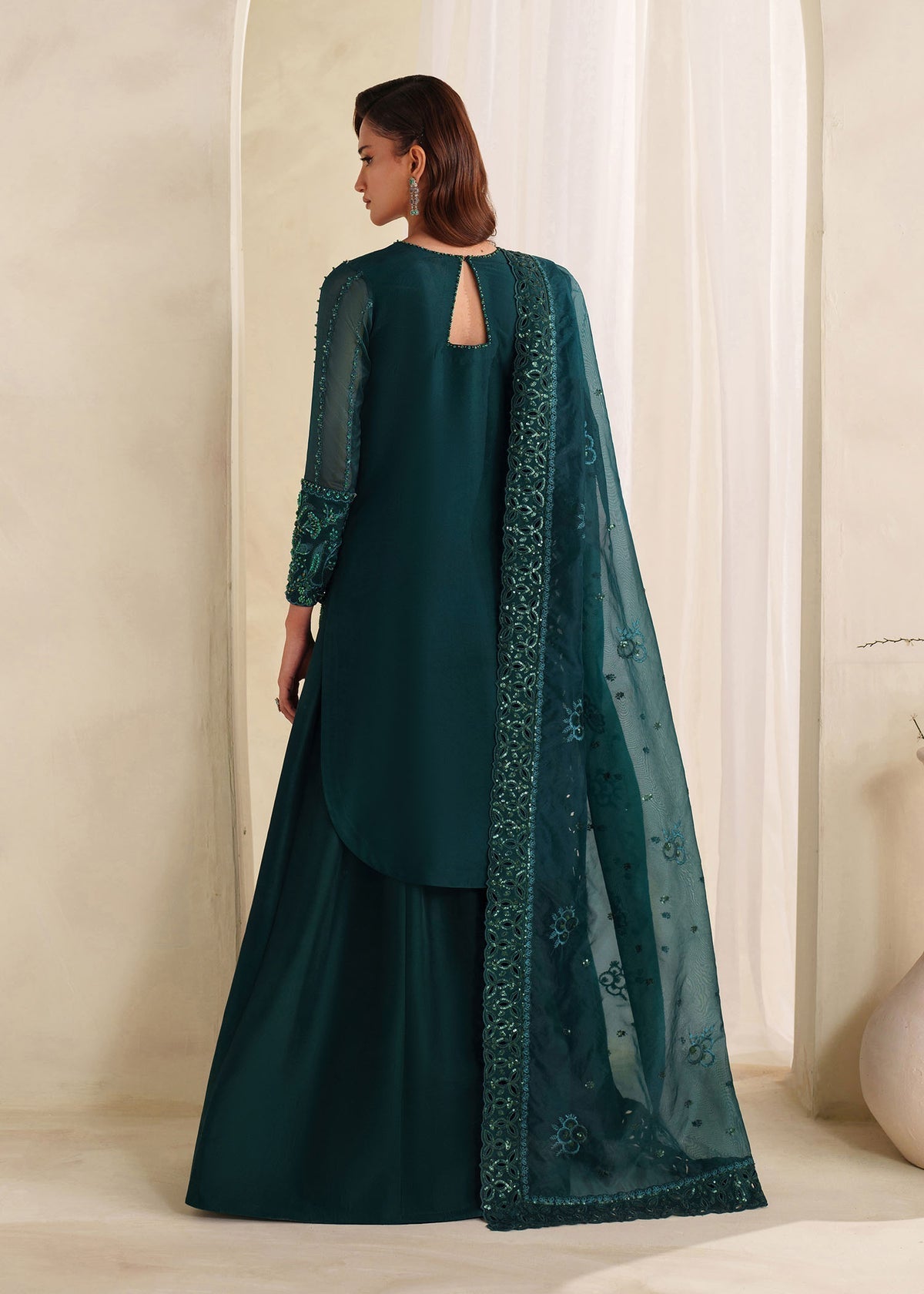 Eiza Style — Mairaz Bottle Green Three-Piece Suit