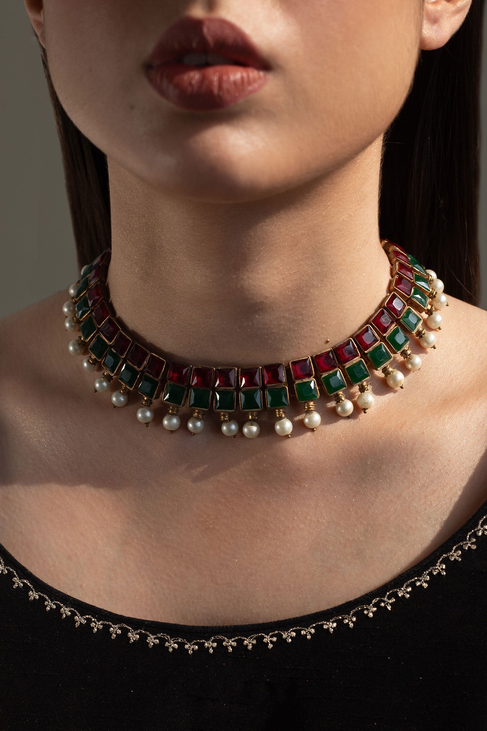 https://cdn.shopify.com/s/files/1/0340/8376/6405/files/GOLDPLATEDQUADNECKLACE.jpg?v=1702310814