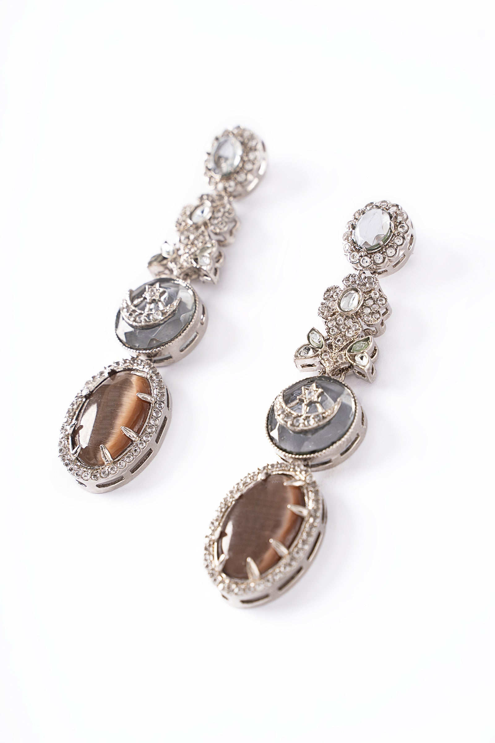 https://cdn.shopify.com/s/files/1/0620/8788/9062/files/JEREA2511BrownCatsEye-3.jpg?v=1746542234