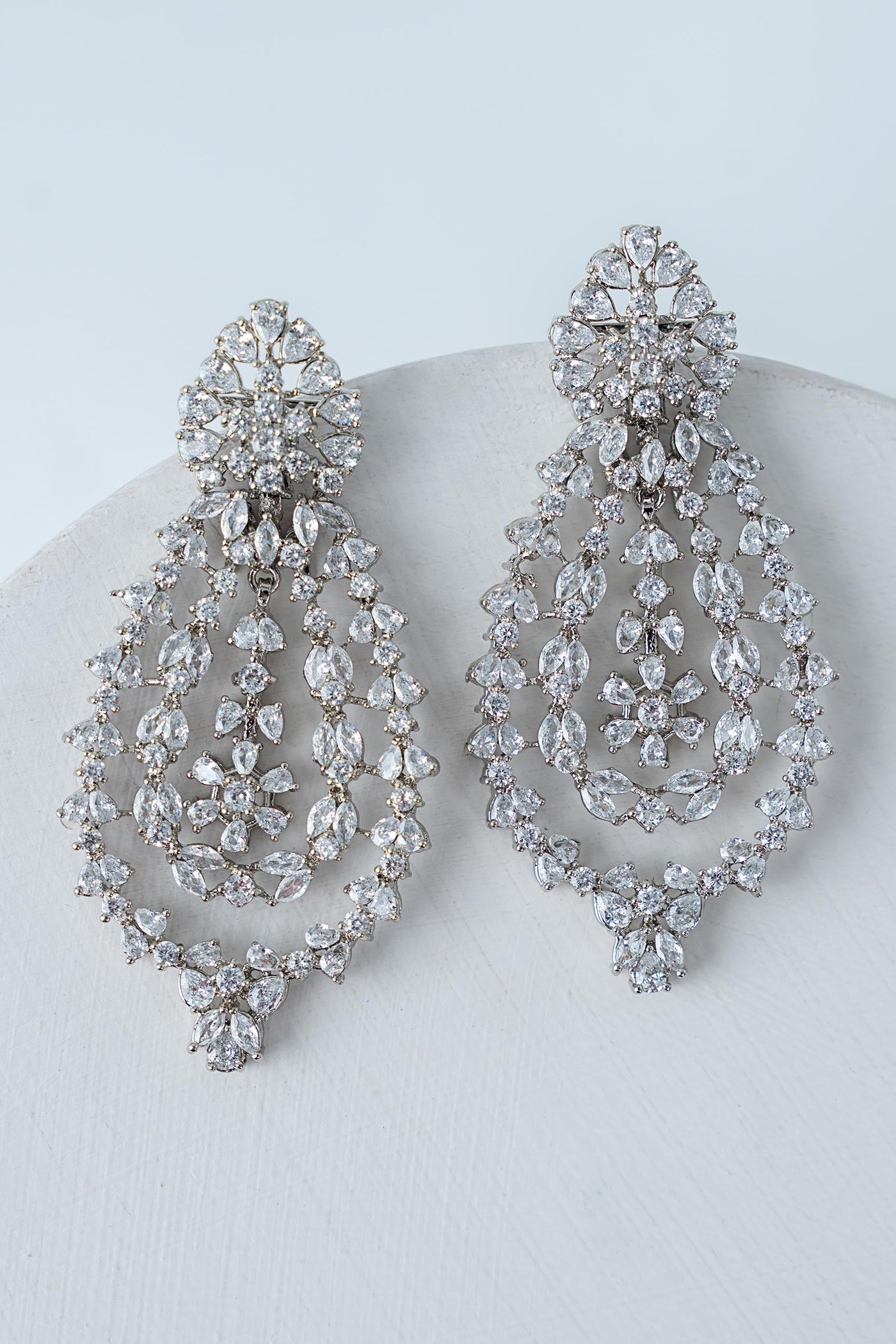 https://cdn.shopify.com/s/files/1/0620/8788/9062/files/JerW25-17WhiteZircon_A.jpg?v=1757502731