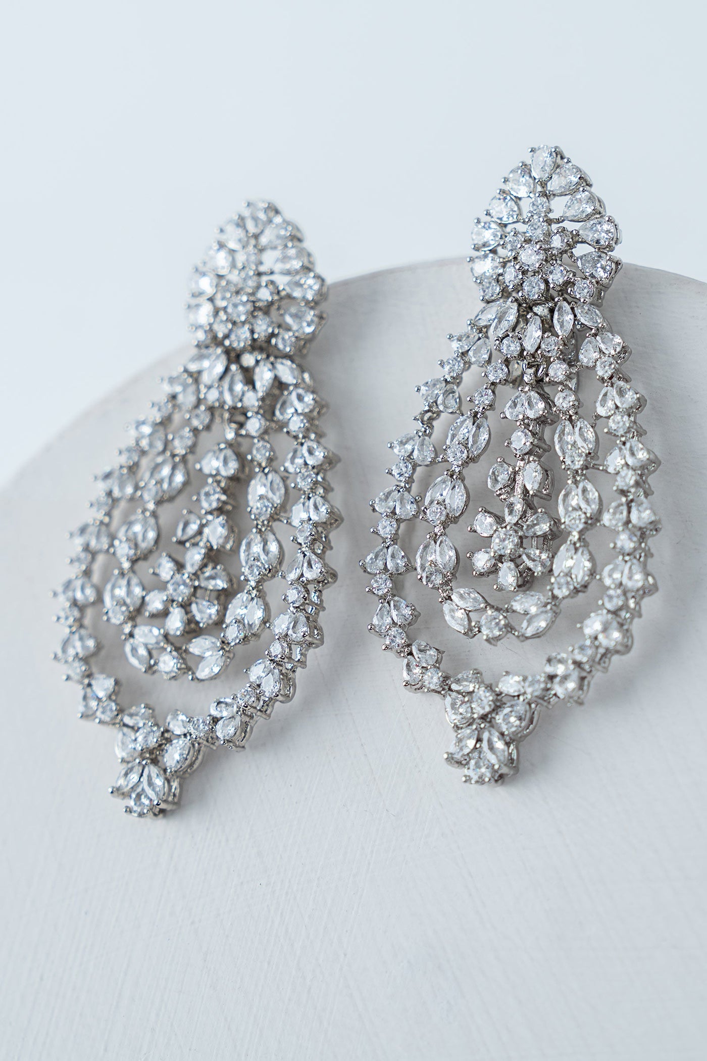https://cdn.shopify.com/s/files/1/0620/8788/9062/files/JerW25-17WhiteZircon_B.jpg?v=1757502731