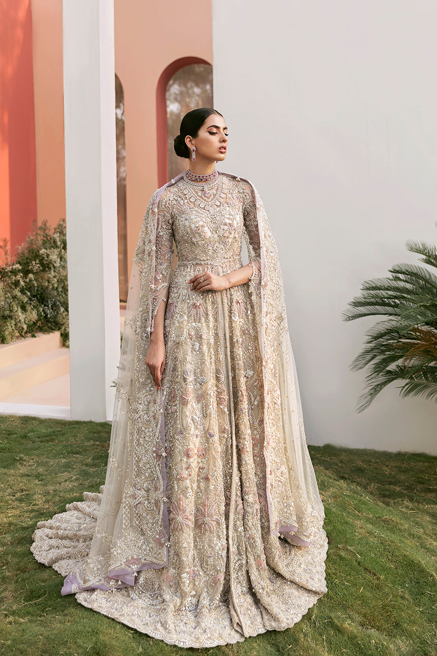 https://cdn.shopify.com/s/files/1/0523/4327/5696/products/Luxury-bridal-gown-Calipso-white-net-gown-with-lavender-detail-mysie-1.jpg?v=1757927741