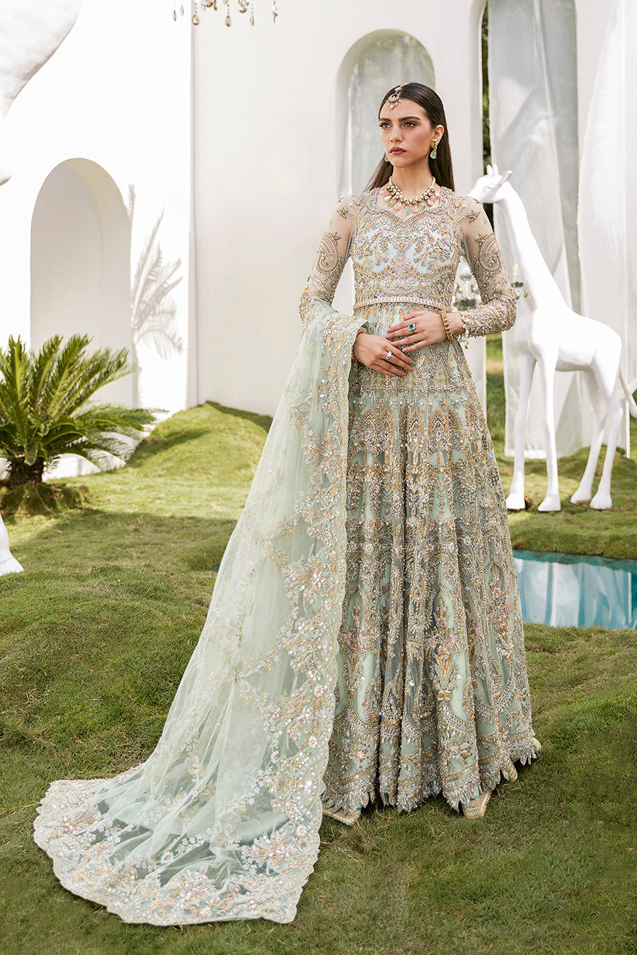 https://cdn.shopify.com/s/files/1/0523/4327/5696/products/Pakistani-bridal-outfit-Cleo-mint-green-frock-and-raw-silk-lehenga-mysie-1.jpg?v=1757926907