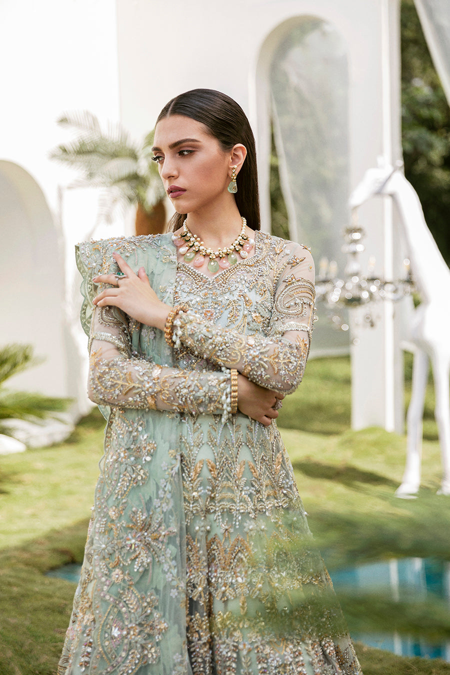 https://cdn.shopify.com/s/files/1/0523/4327/5696/products/Pakistani-bridal-outfit-Cleo-mint-green-frock-and-raw-silk-lehenga-mysie-4.jpg?v=1757927085