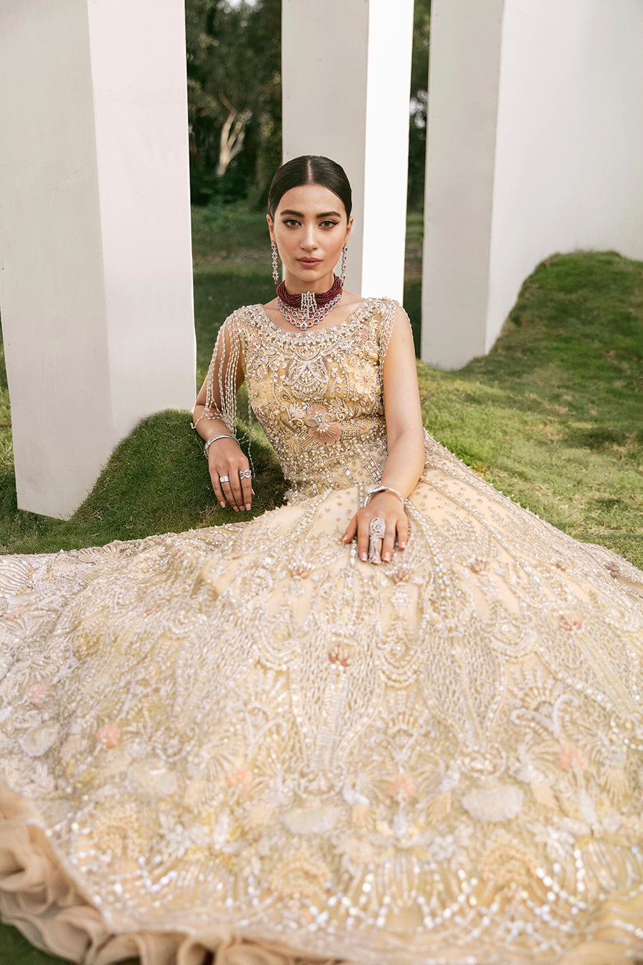 https://cdn.shopify.com/s/files/1/0523/4327/5696/products/Pakistani-bridal-outfit-Maia-champagne-gold-net-gown-mysie-5.jpg?v=1757929580