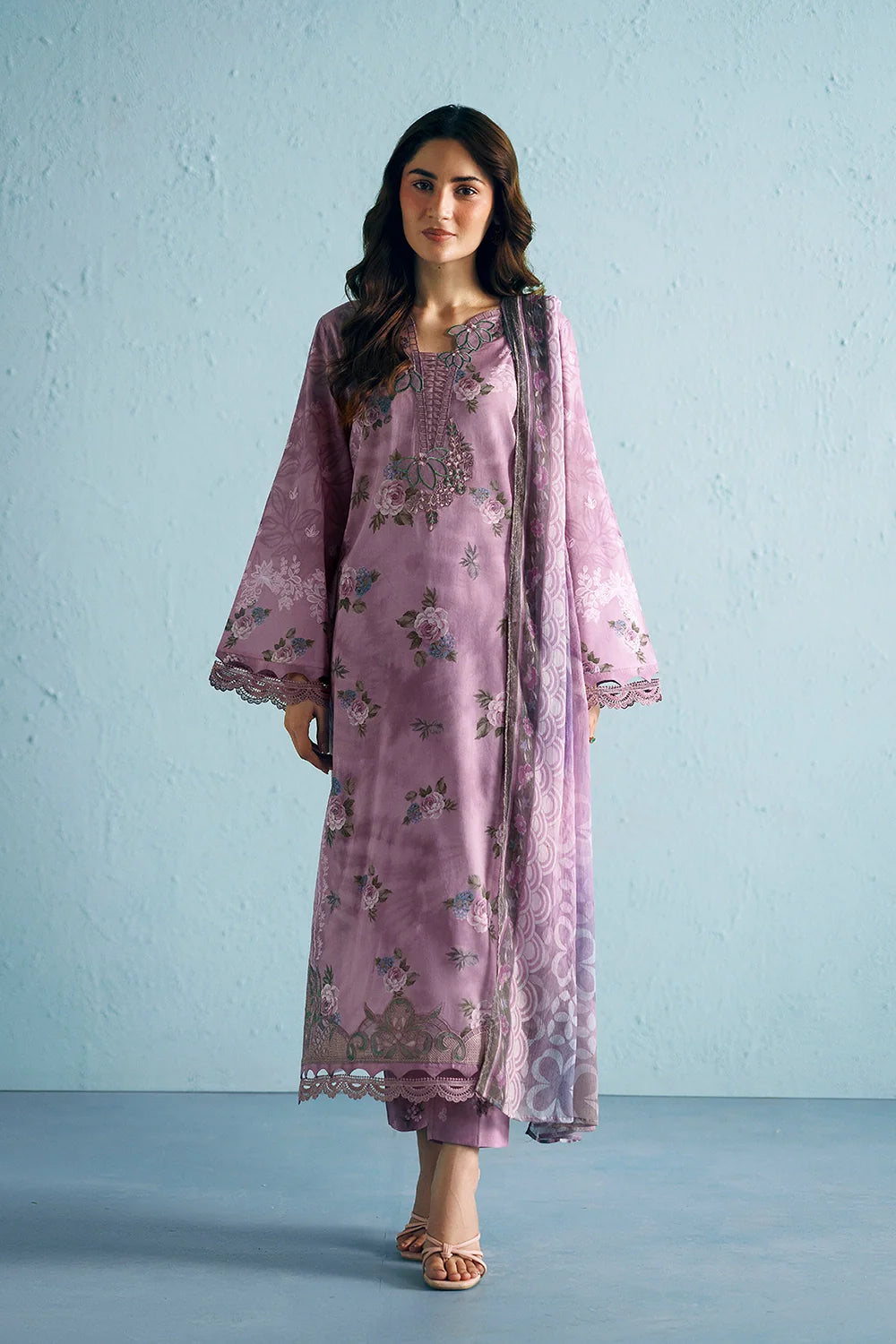 https://cdn.shopify.com/s/files/1/0019/7217/4947/files/PinkLawnShirtwithChiffonDupattaandCottonTrouser-SummerySky-Vol1-35.webp?v=1781347230
