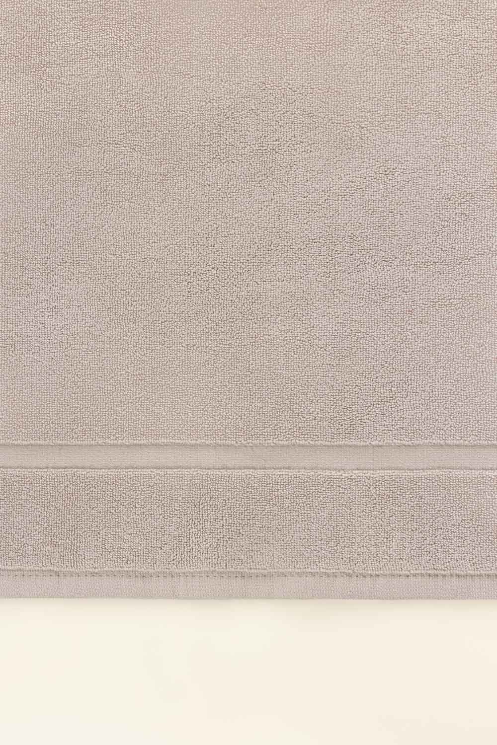 https://cdn.shopify.com/s/files/1/0706/3253/8159/files/ash-lilac-terry-bath-mat-gulahmed-front._2.jpg?v=1758373779