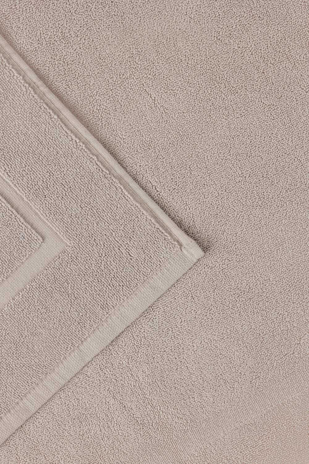 https://cdn.shopify.com/s/files/1/0706/3253/8159/files/ash-lilac-terry-bath-mat-gulahmed-front._3.jpg?v=1758373779