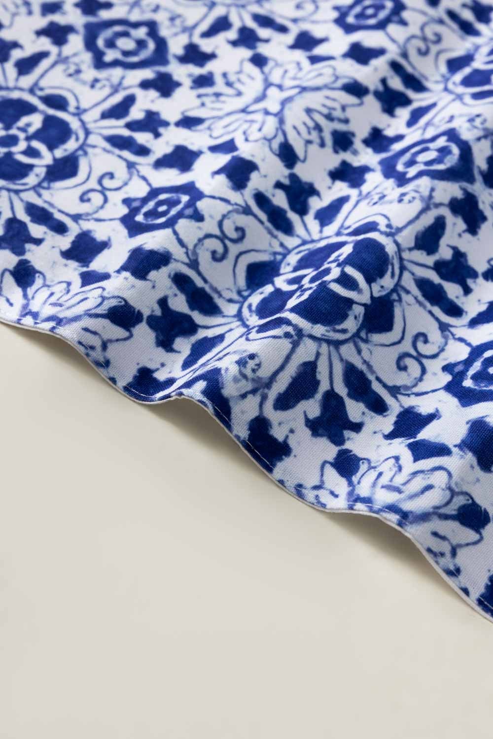 https://cdn.shopify.com/s/files/1/0706/3253/8159/files/blue-tiles-digital-place-mats-set-gulahmed-closeup-3_jpg.jpg?v=1758373775