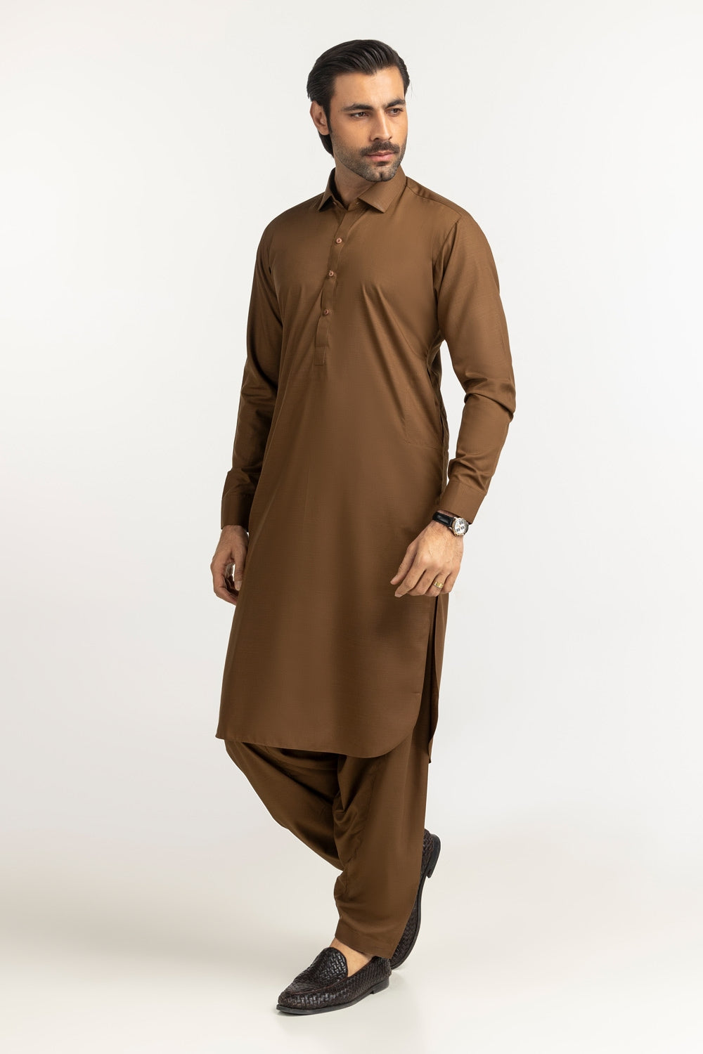 https://cdn.shopify.com/s/files/1/0706/3253/8159/files/catalyst-co-unstitched-fabric-washnwear-dark-kathai-brown-fullshot-side2.jpg?v=1758383502