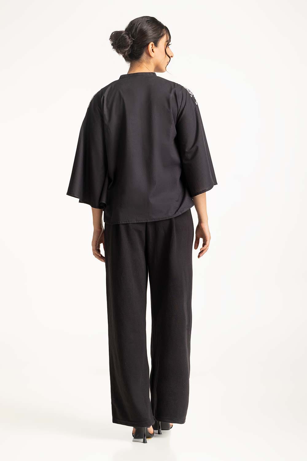 https://cdn.shopify.com/s/files/1/0706/3253/8159/files/embroidred_top_wm-cs-ss24-006_2.jpg?v=1758455775