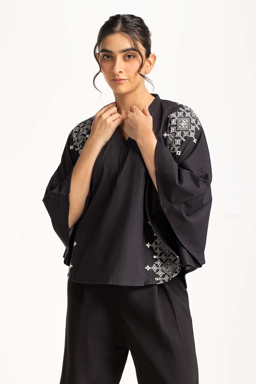 https://cdn.shopify.com/s/files/1/0706/3253/8159/files/embroidred_top_wm-cs-ss24-006_7.jpg?v=1758455775